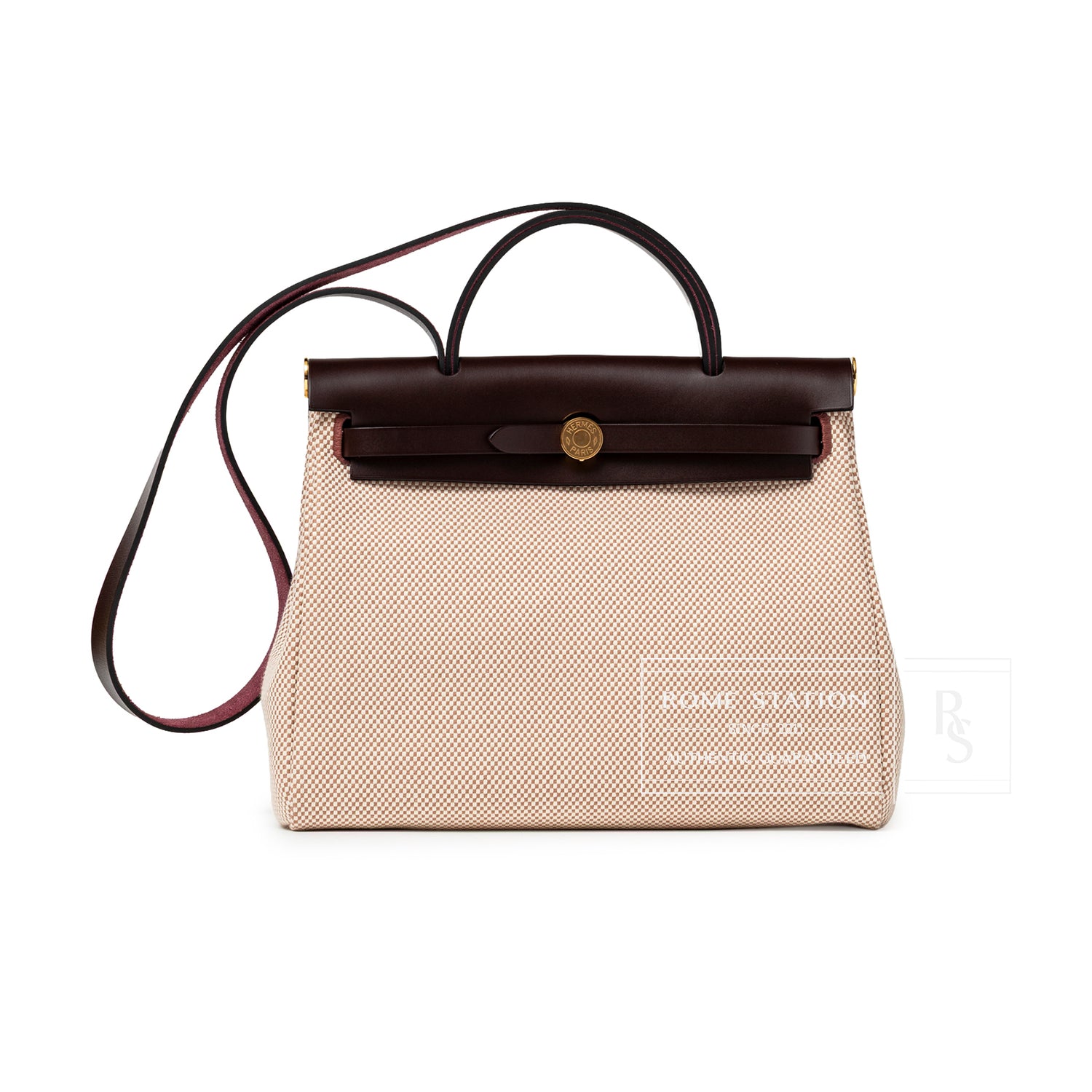 Front view of Hermès Herbag Zip PM 31 Ecru and Beige Toile H Ebene Hunter Gold Hardware with leather trim and gold clasp
