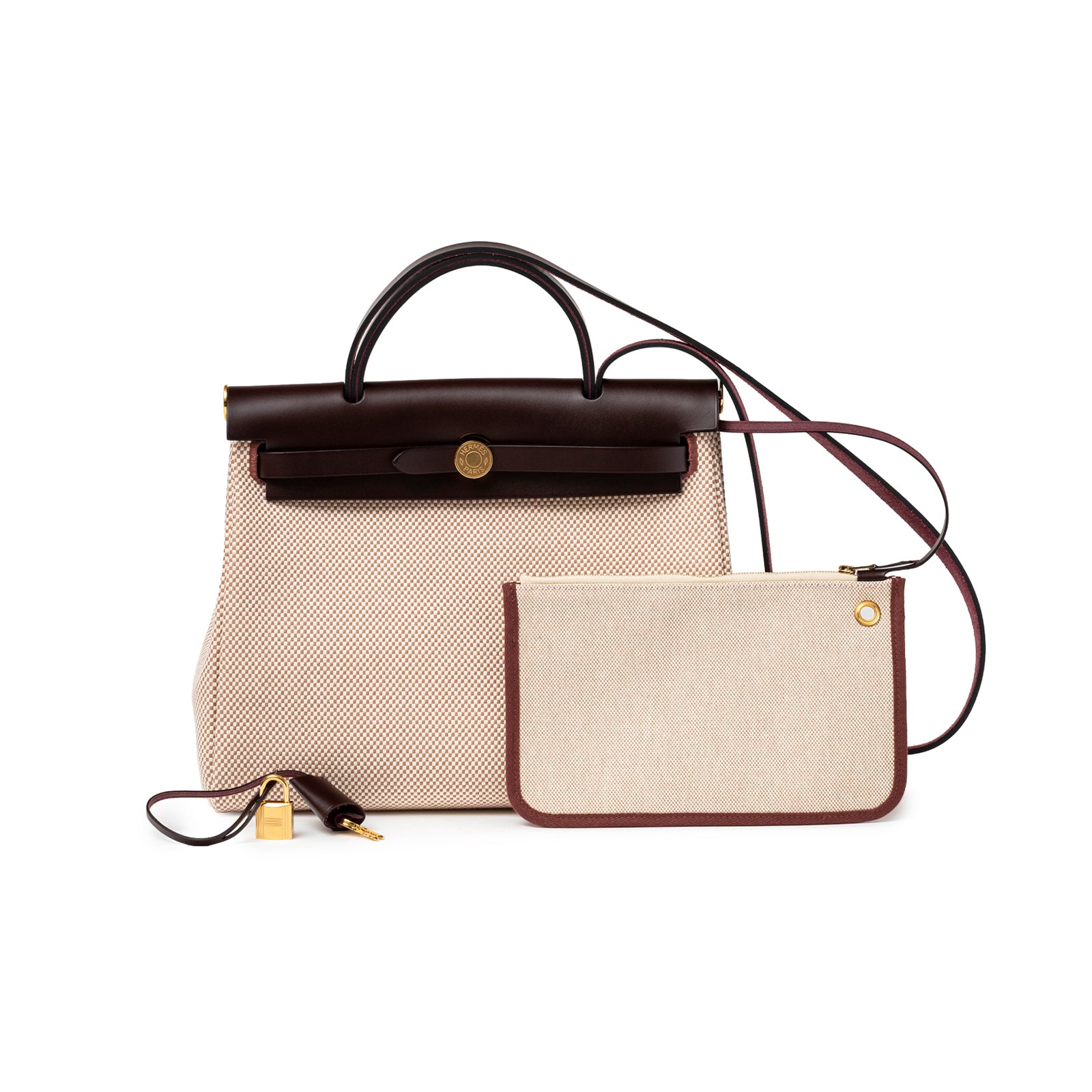 Front view of Hermès Herbag Zip PM 31 Ecru and Beige Toile H Ebene Hunter Gold Hardware with detachable pouch and lock details