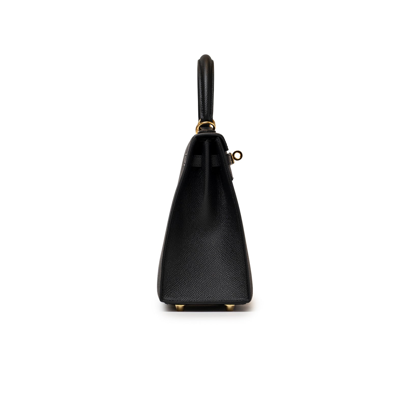 Side profile of the elegant Hermès Kelly 25 Sellier Black Epsom Gold hardware bag showcasing its structured silhouette and fine craftsmanship