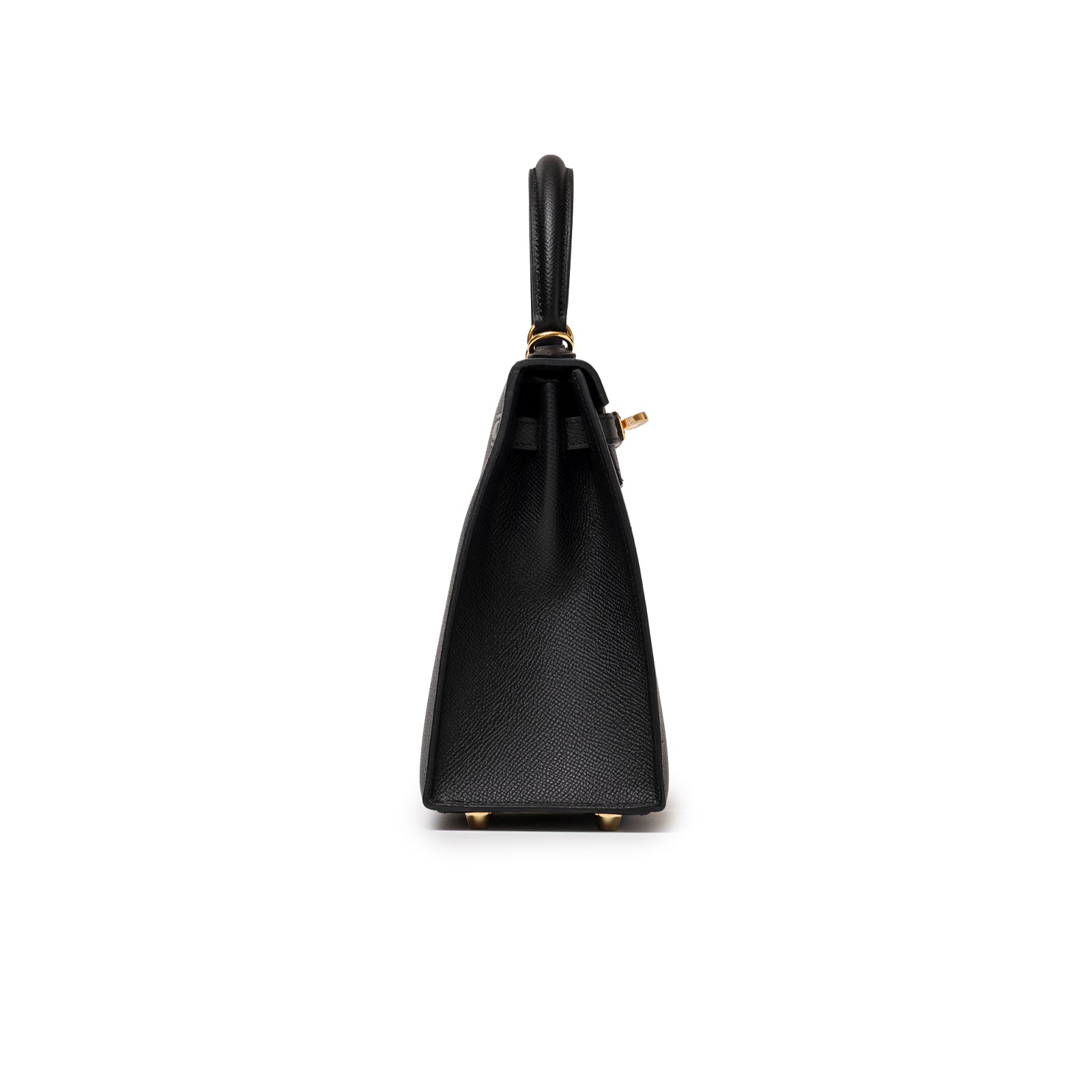 Side profile showing textured black Epsom leather and gold hardware on Hermès Kelly 25 Sellier Black Epsom Gold Hardware