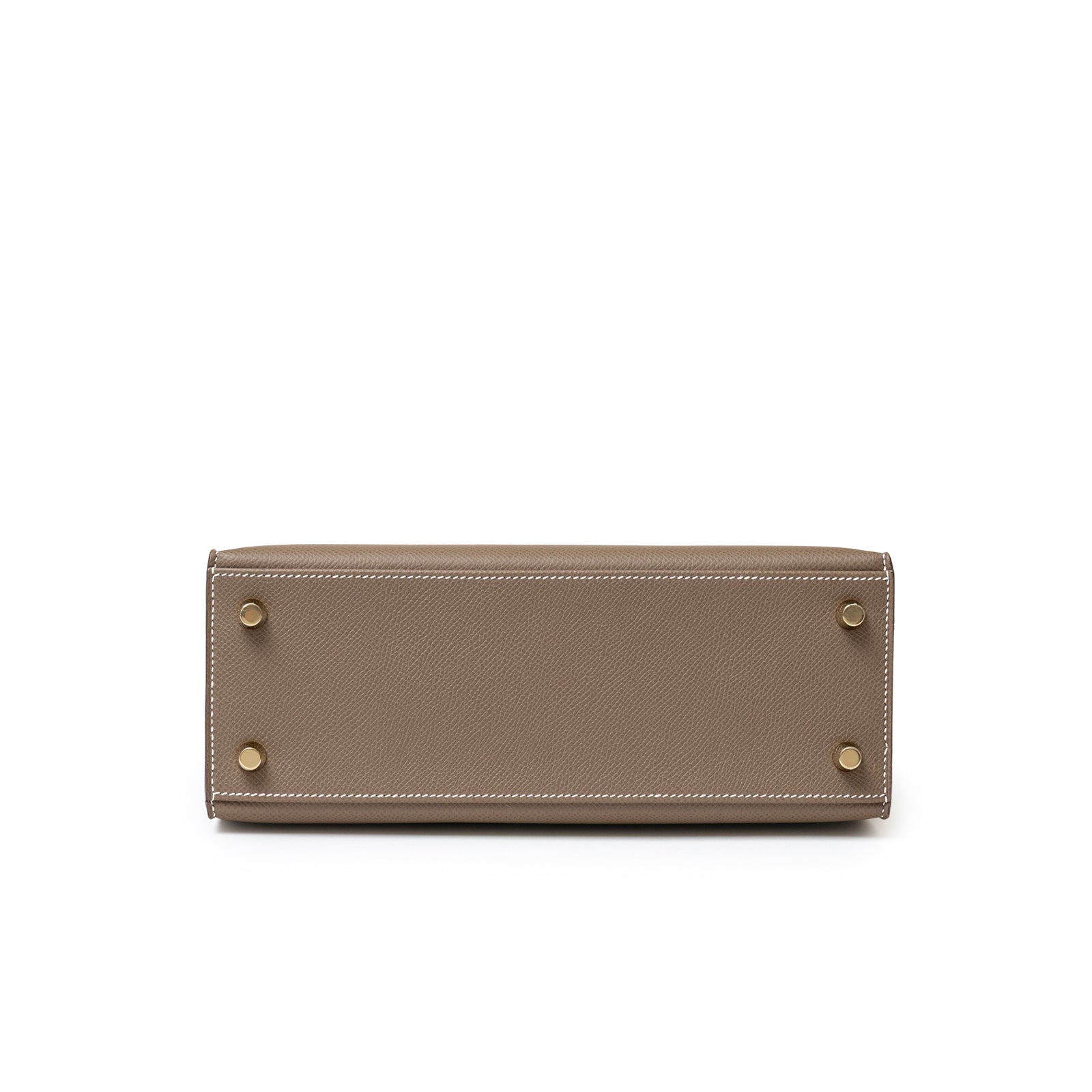 Bottom view of Hermès Kelly 25 Sellier Etoupe Epsom Gold Hardware showing base with protective feet and stitching detail