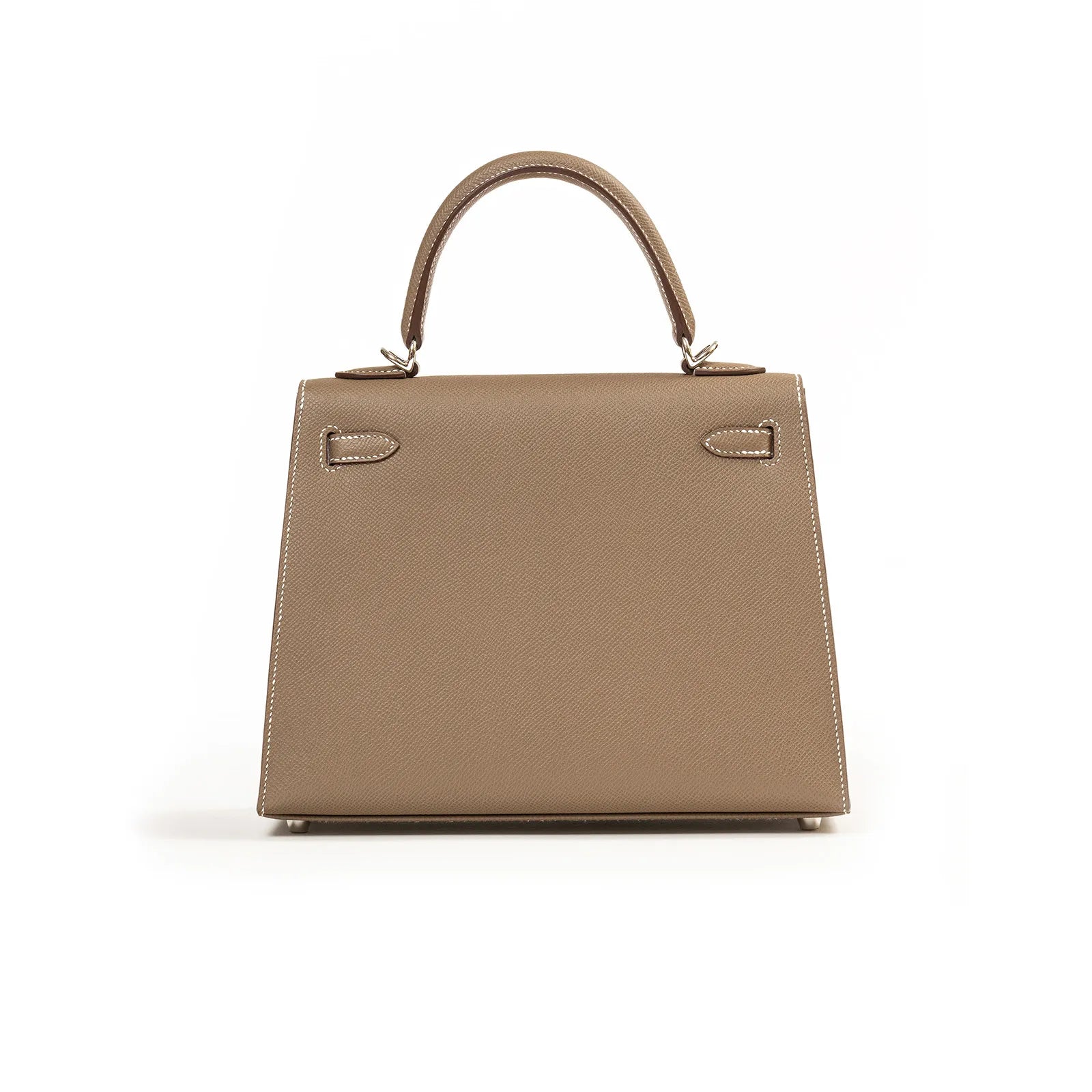 Back view of Hermès Kelly 25 Sellier Etoupe Epsom Palladium Hardware handbag with short handle, elegant design, centered on a white background.