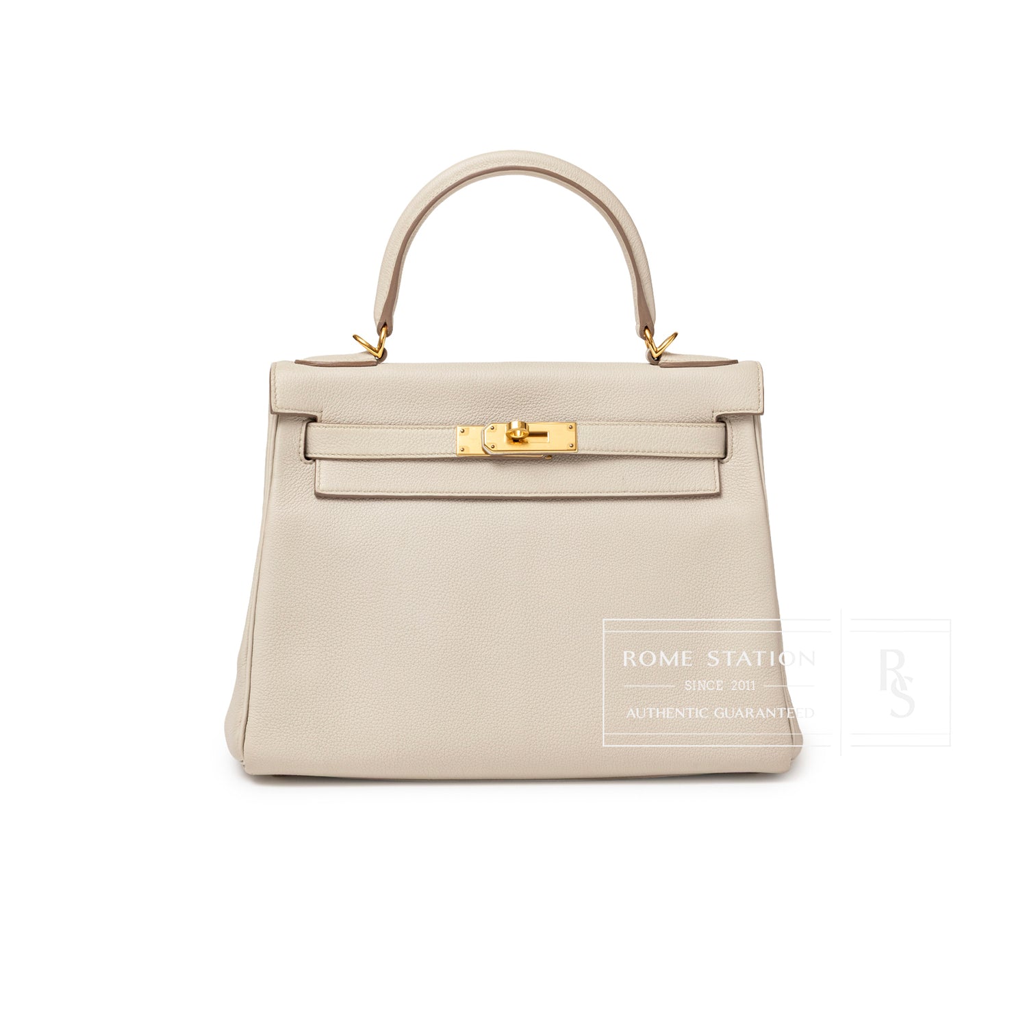 Front view of Hermès Kelly 28 Retourne Beton Togo Gold Hardware showcasing smooth gray leather and gold clasp detail