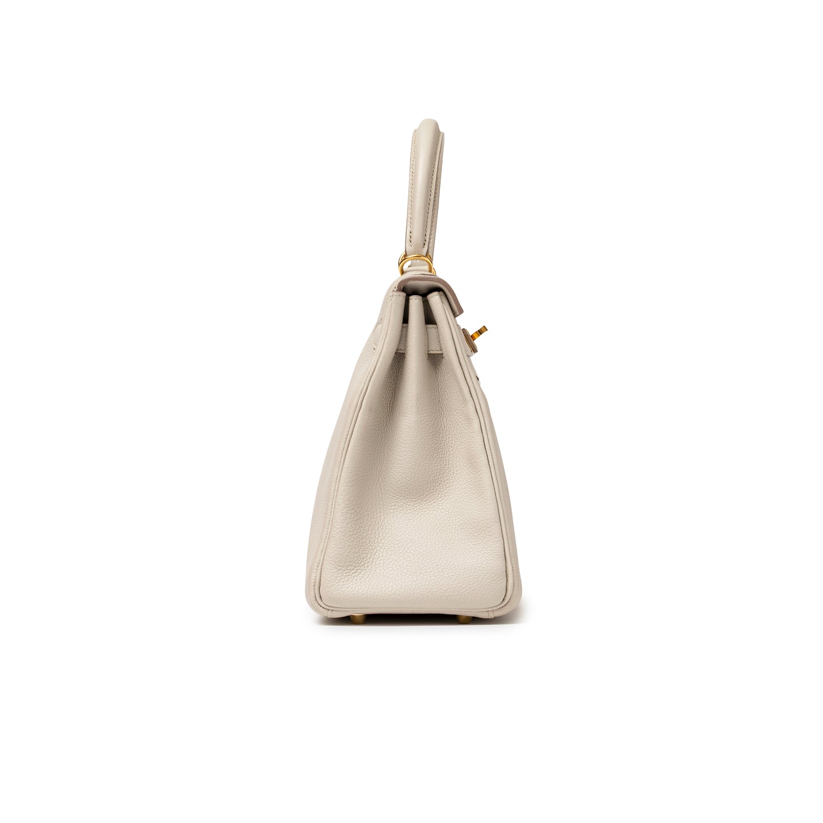 Side profile of Hermès Kelly 28 Retourne Beton Togo Gold Hardware showing smooth leather and handle detail