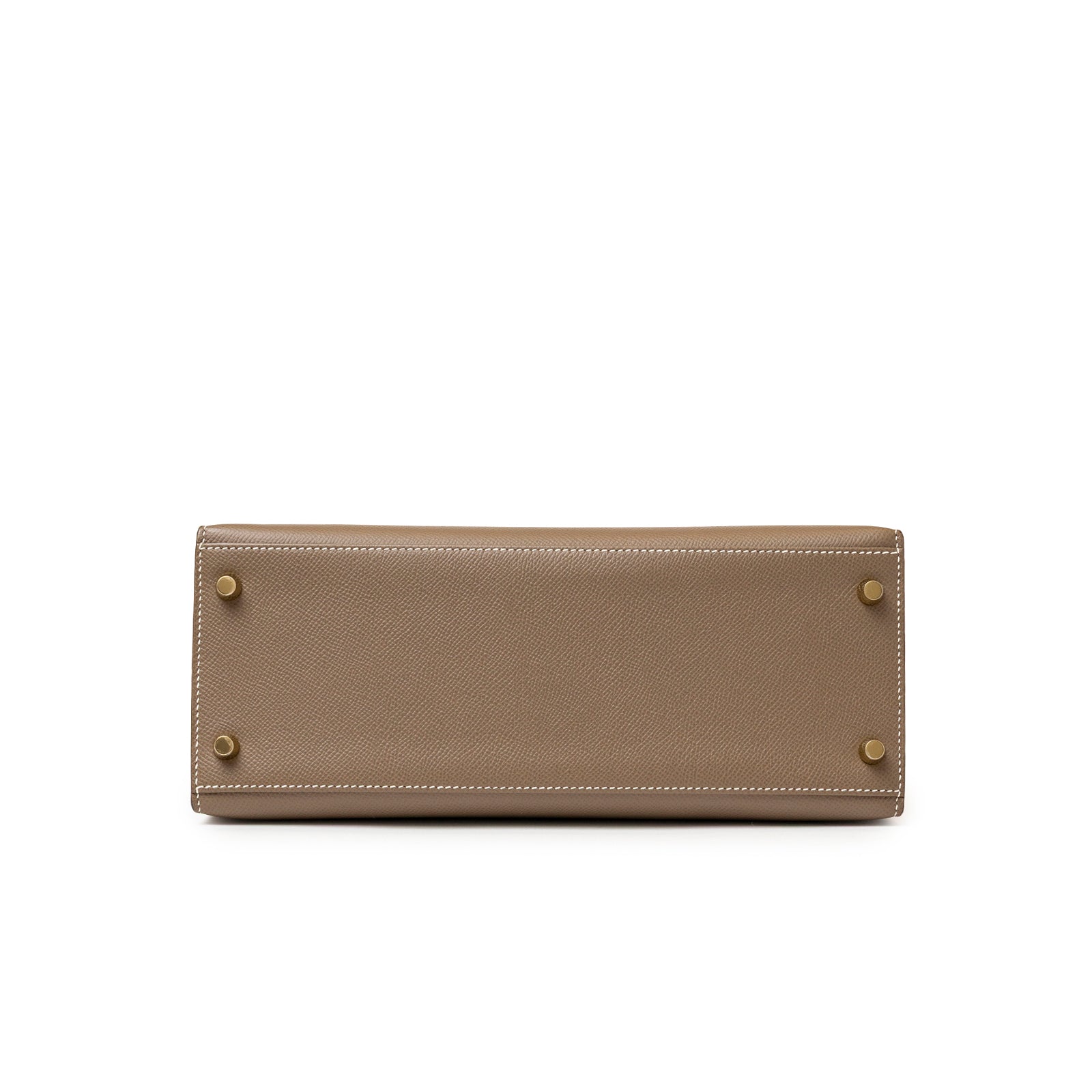 Bottom view of Hermès Kelly 28 Sellier Etoupe Epsom Gold hardware highlighting sturdy base and protective feet.