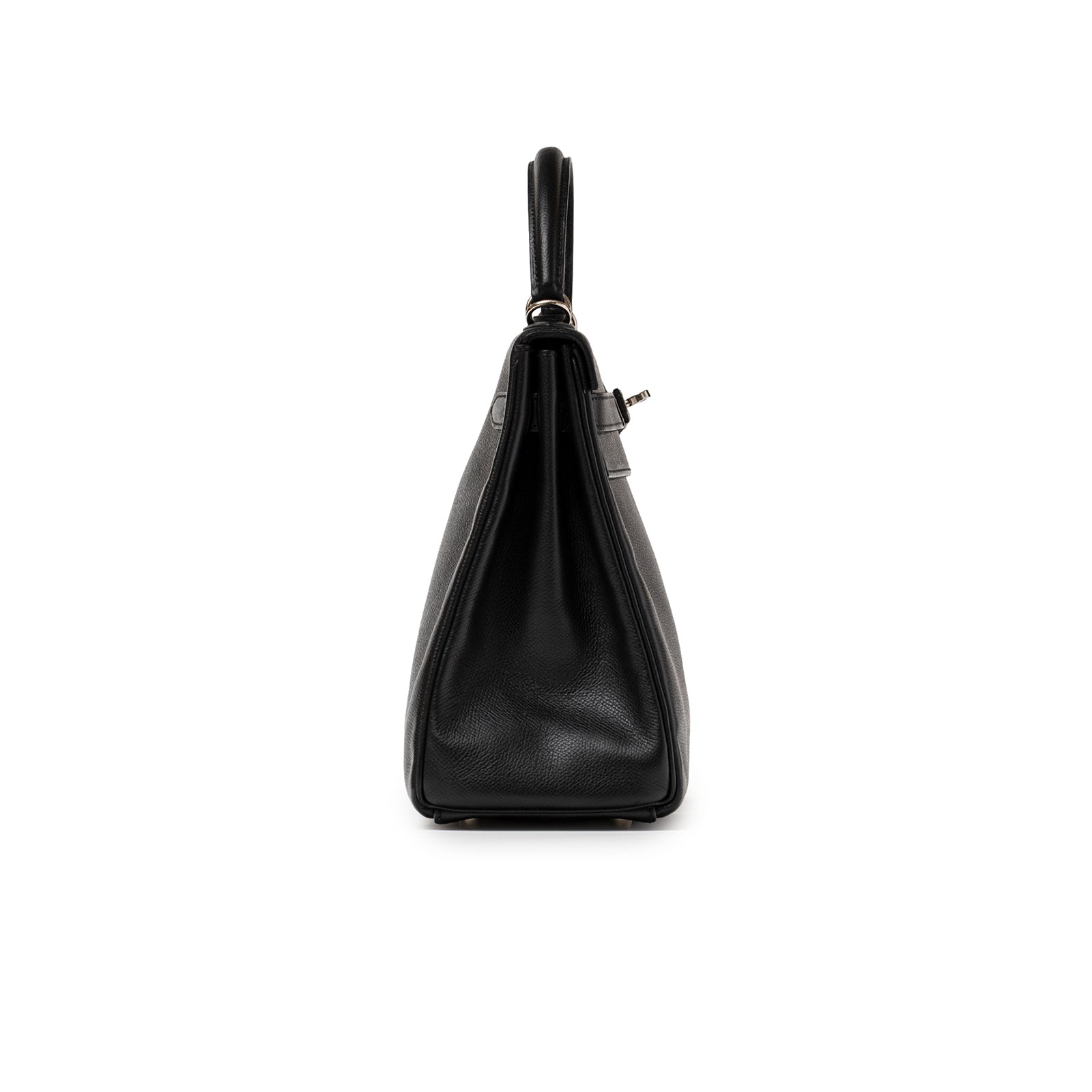 Side profile of Hermès Kelly 32 Black Epsom Palladium Hardware highlighting smooth leather texture and handle details