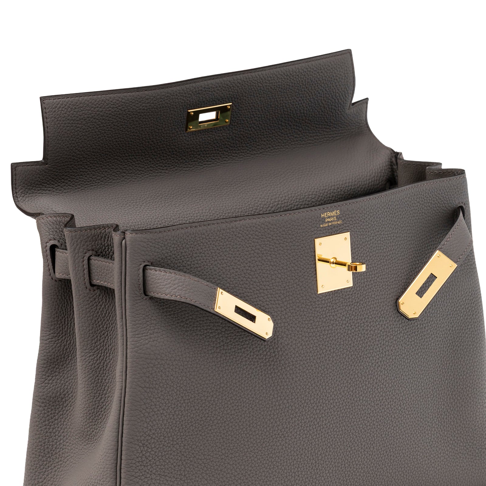 Close-up front view of open Hermès Kelly 32 Retourne Etain Togo Gold Hardware showing clasp details