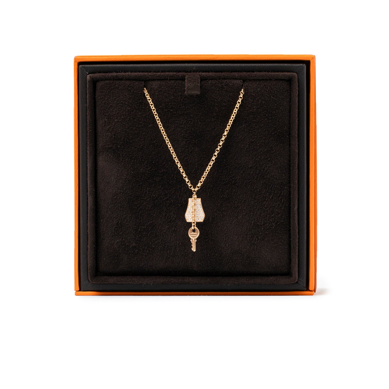 Front view of Hermès Kelly Clochette Bracelet 18K Rose Gold Diamonds with key charm in black box