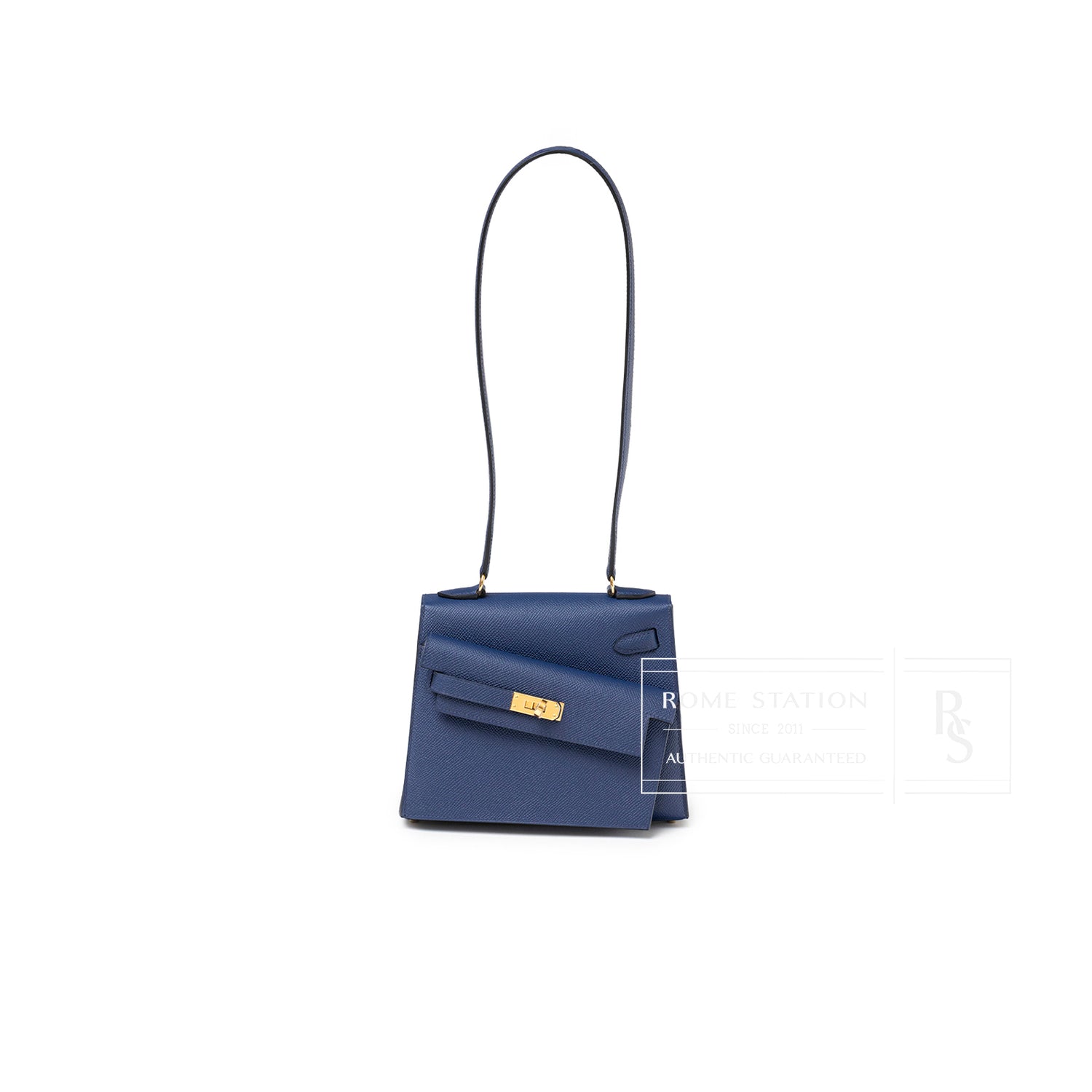 Front view of Hermès Kelly Desordre 20 Sellier Blue Saphir Epsom Gold Hardware with long strap and gold clasp