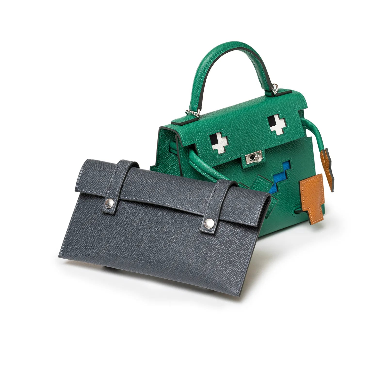 Hermès Kelly Dole Picto Vertigo /Gold/Zanzibar/Misty Epsom Palladium Hardware bag on a white background.