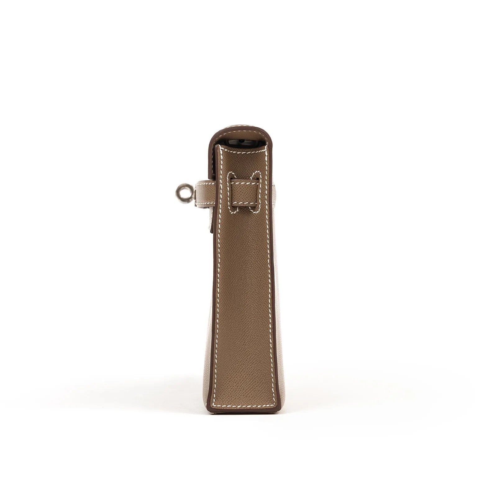 Side profile of Hermès Kelly Elan Etoupe Madame Palladium Hardware showcasing leather texture and stitching detail