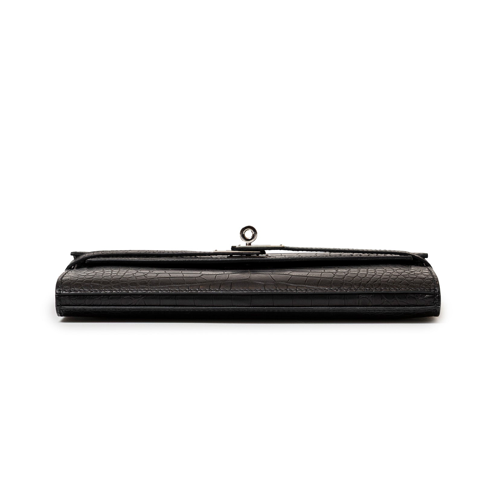 Bottom view of Hermès Kelly Long Wallet Black Matte Alligator Palladium Hardware showing sleek edges and clasp detail