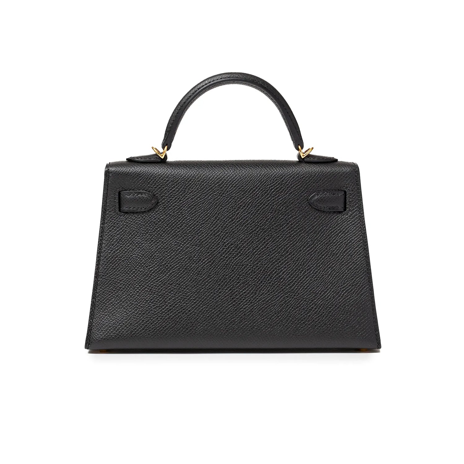 Back view of black textured handbag with gold hardware and top handle.