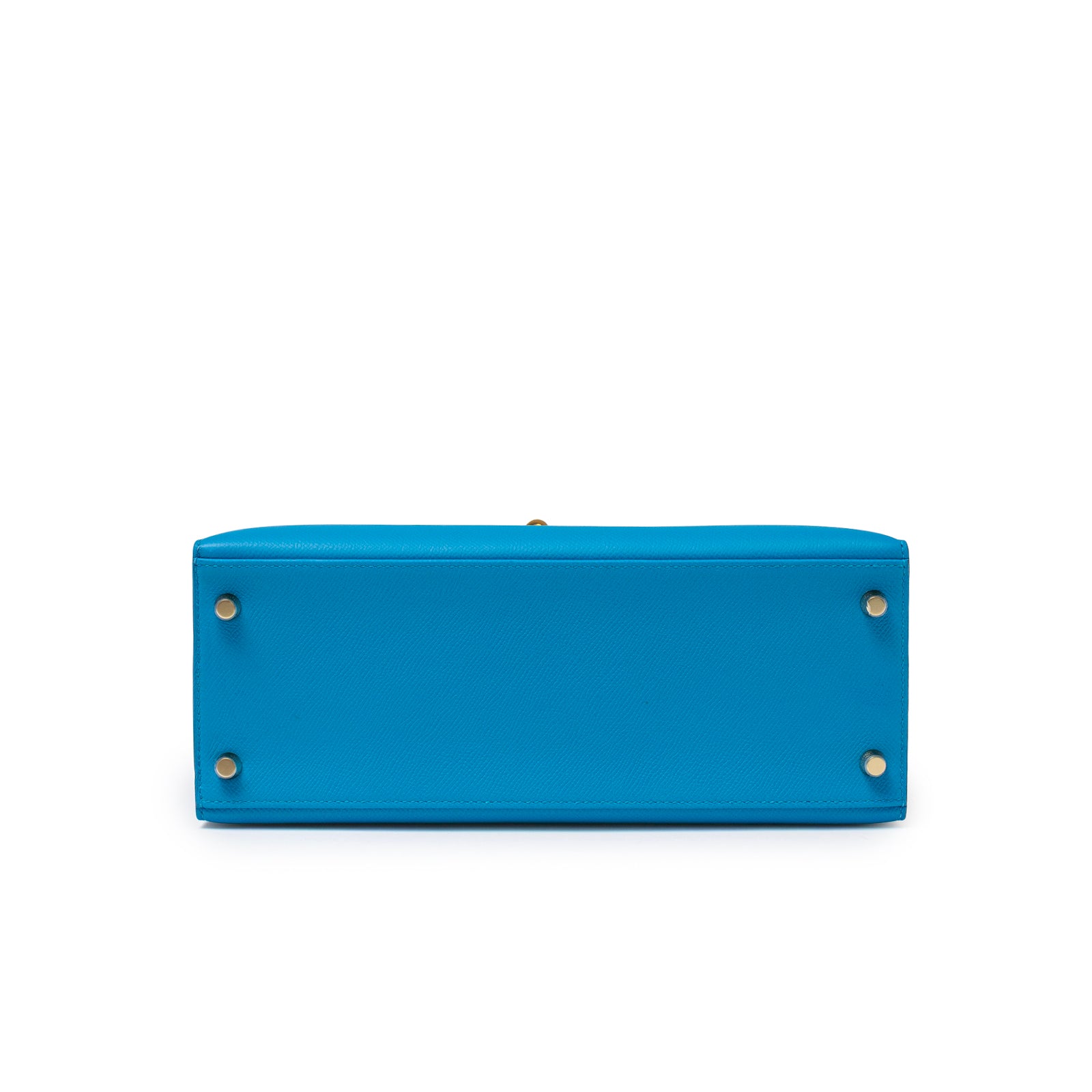 Bottom view of Hermès Kelly Sellier 28 Blue Zanzibar Epsom Gold Hardware showing base and protective studs.