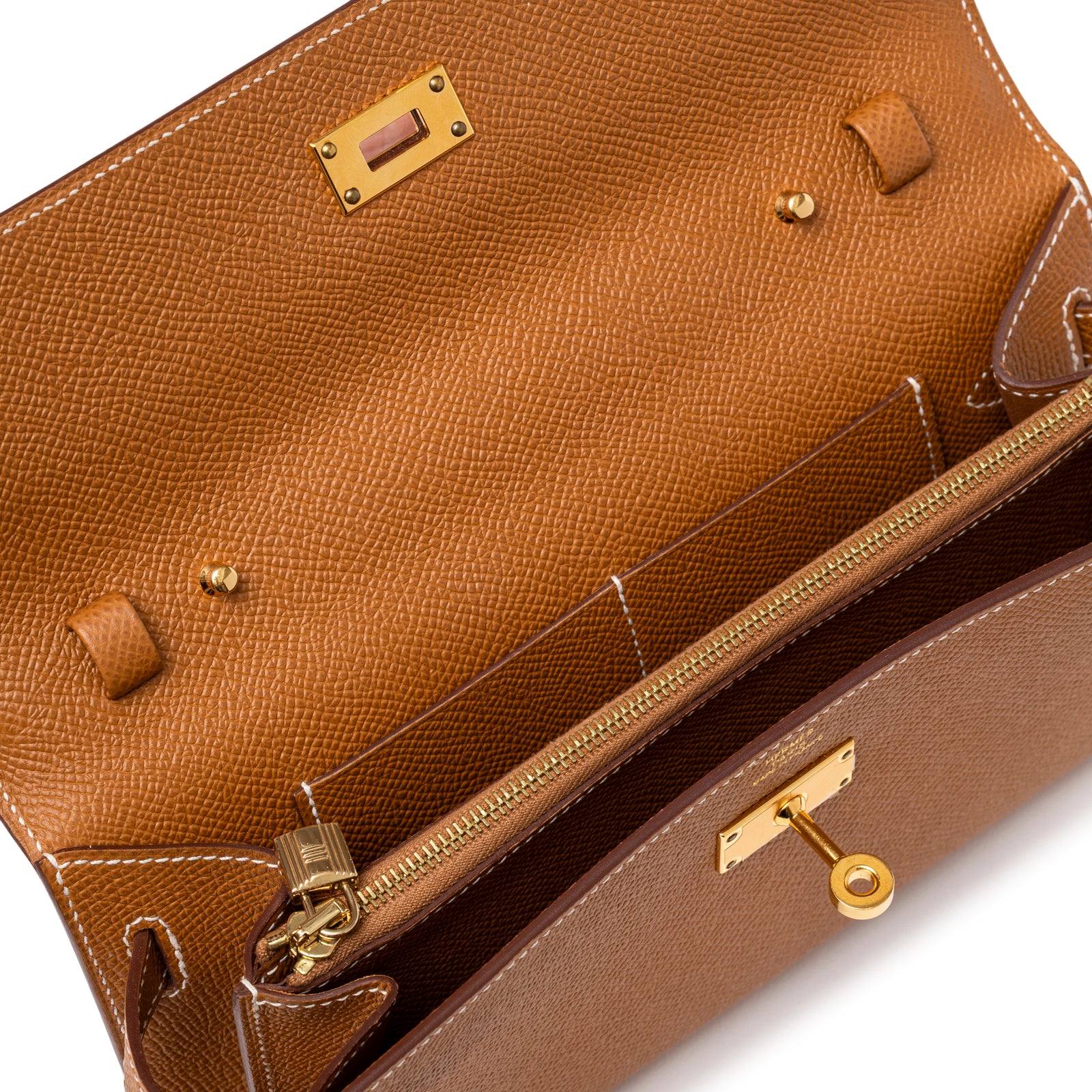 Interior view of Hermès Kelly Wallet To Go Gold Epsom Gold Hardware revealing zippered compartment and card slots