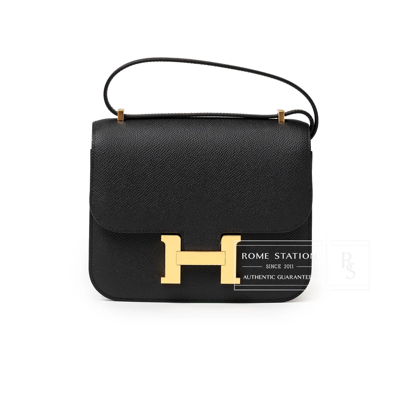 Front view of Hermès Mini Constance 18 Black Epsom Gold Hardware with signature gold clasp and smooth texture