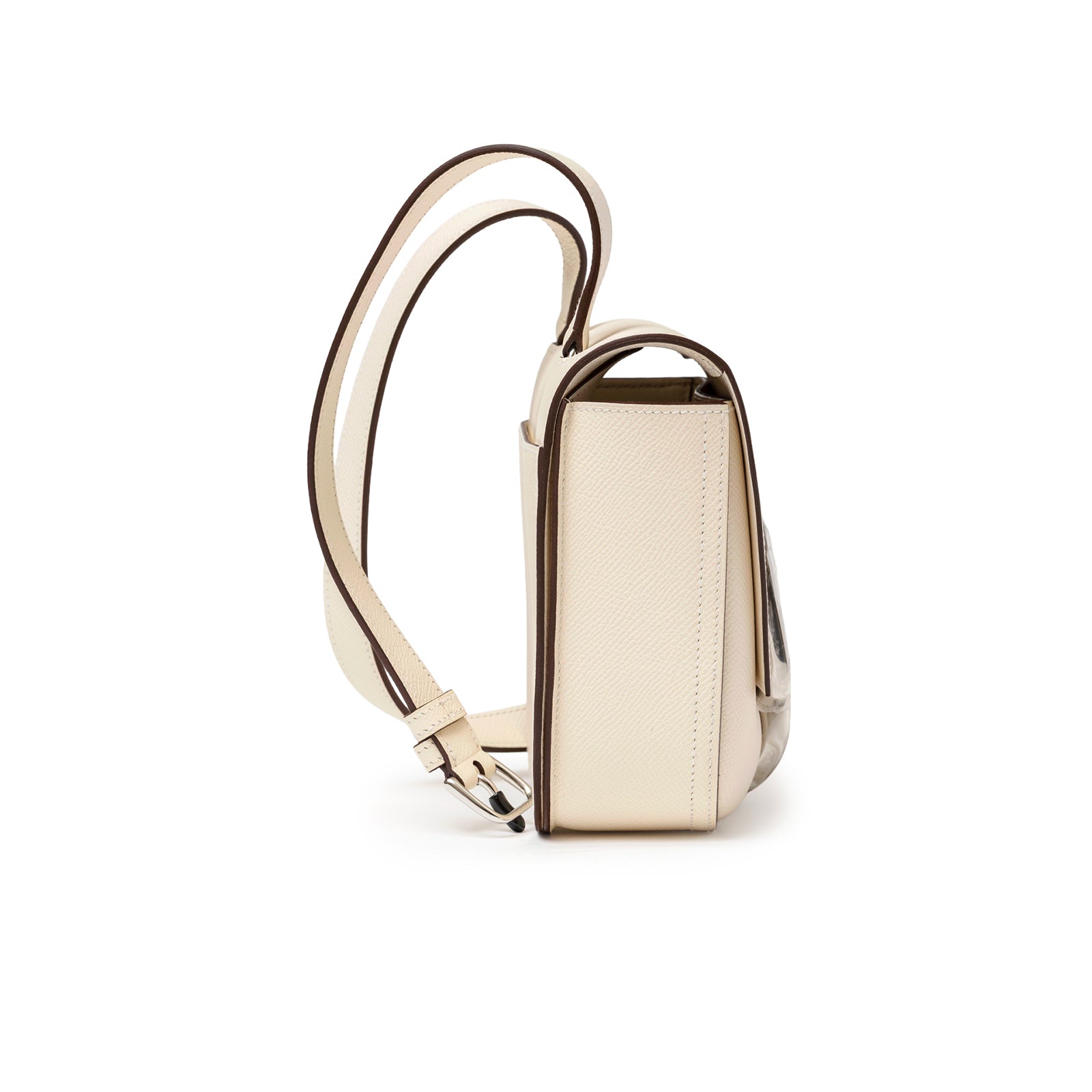 Side view of Hermès Mini Della Cavalleria Craie Epsom Palladium Hardware with cream textured leather and strap detail
