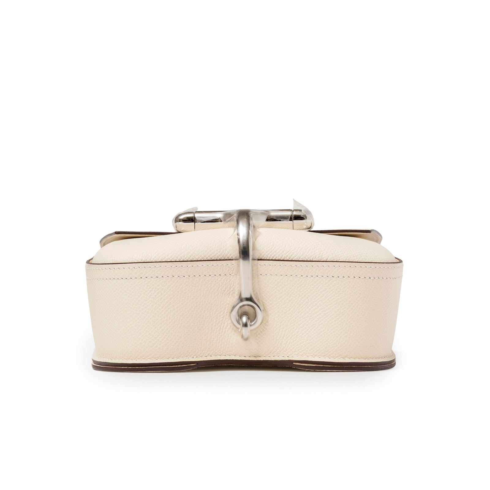 Bottom view of Hermès Mini Della Cavalleria Craie Epsom Palladium Hardware highlighting textured cream leather and metal clasp detail