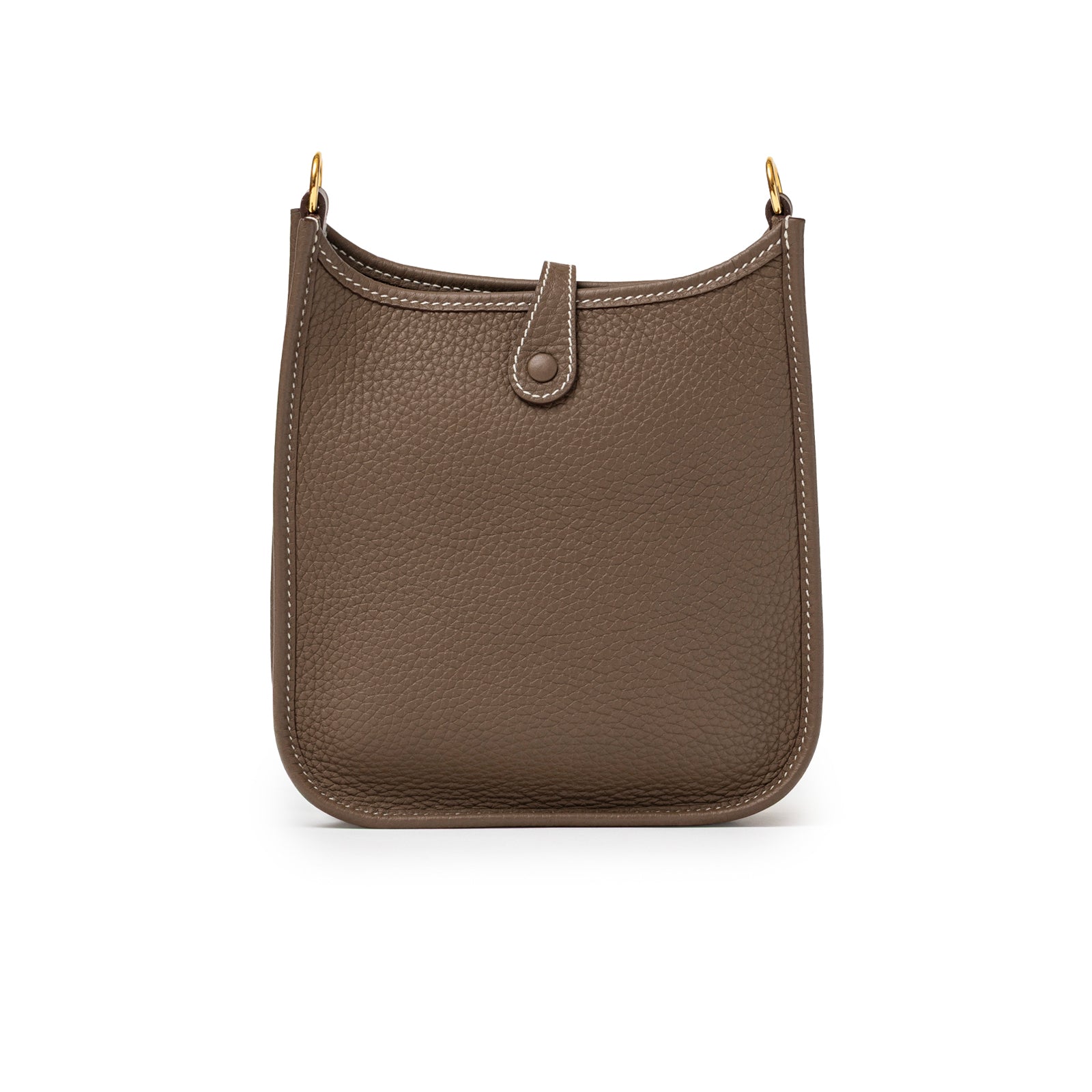 Back view of Hermès Mini Evelyne Etoupe Blue Indigo Clemence Gold Hardware showing smooth leather and tab closure detail