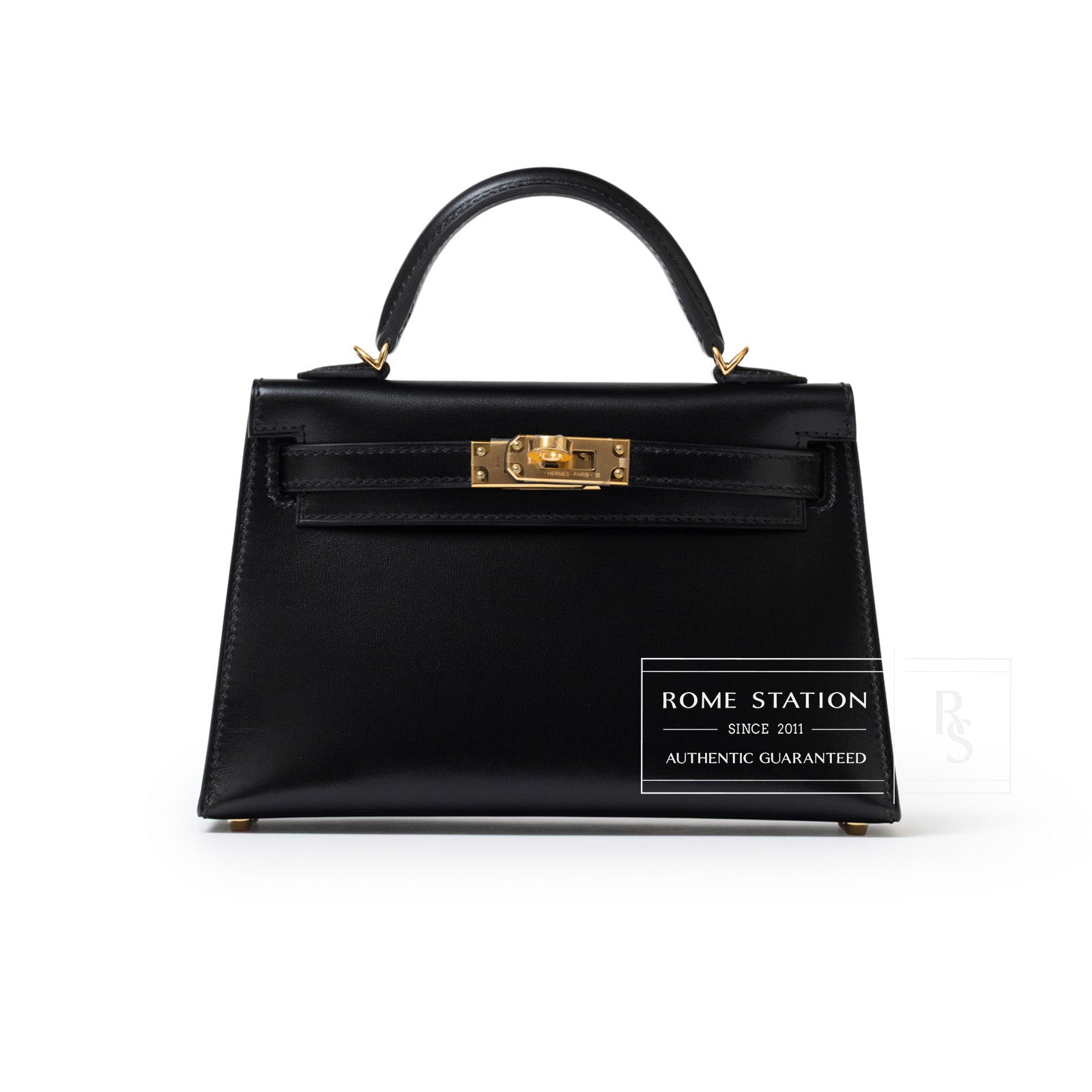 Front view of Hermès Mini Kelly II Sellier 20 Black Box Gold Hardware handbag with top handle and clasp detail