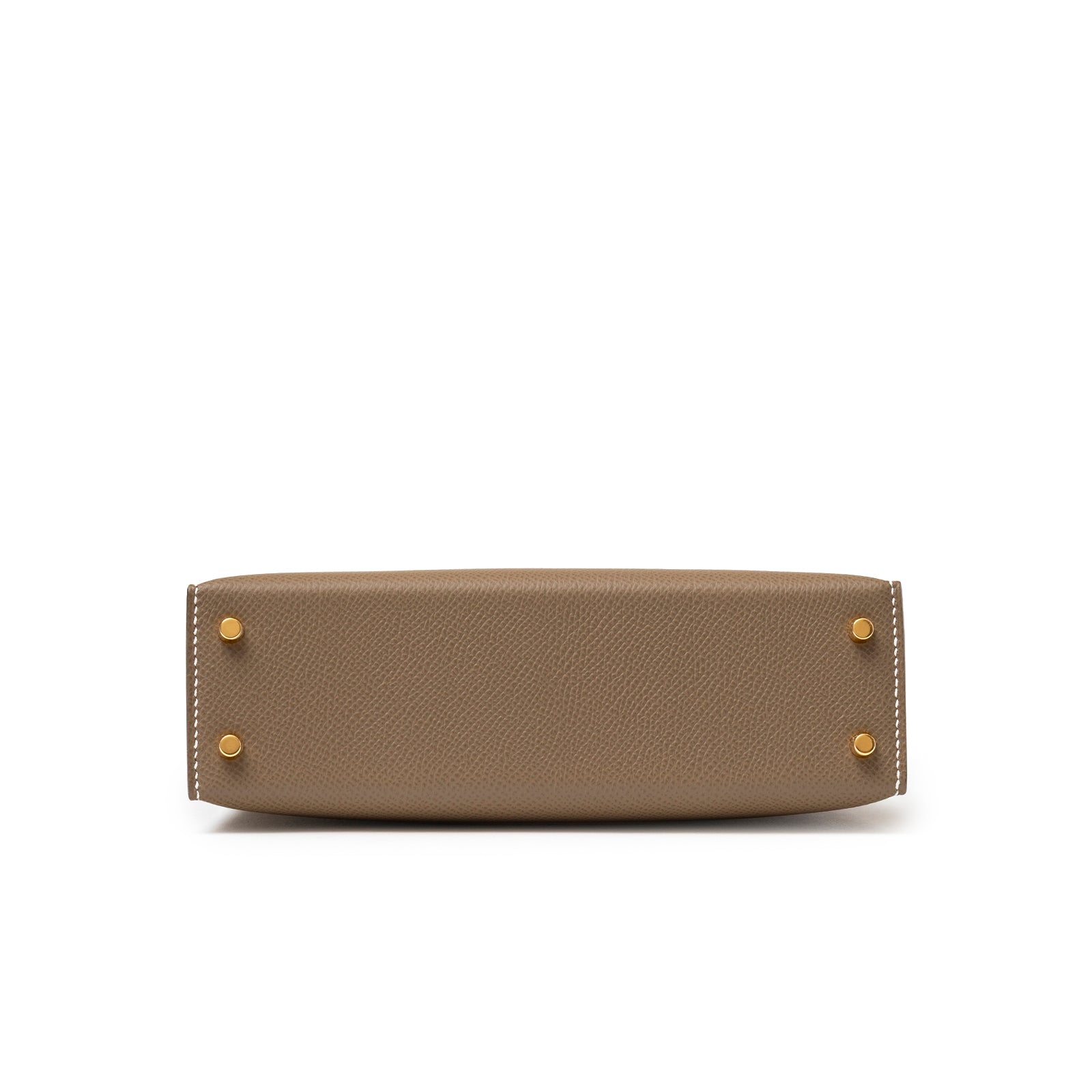 Bottom view of Hermès Mini Kelly II Sellier Etoupe Epsom Gold Hardware showing gold feet and textured leather surface