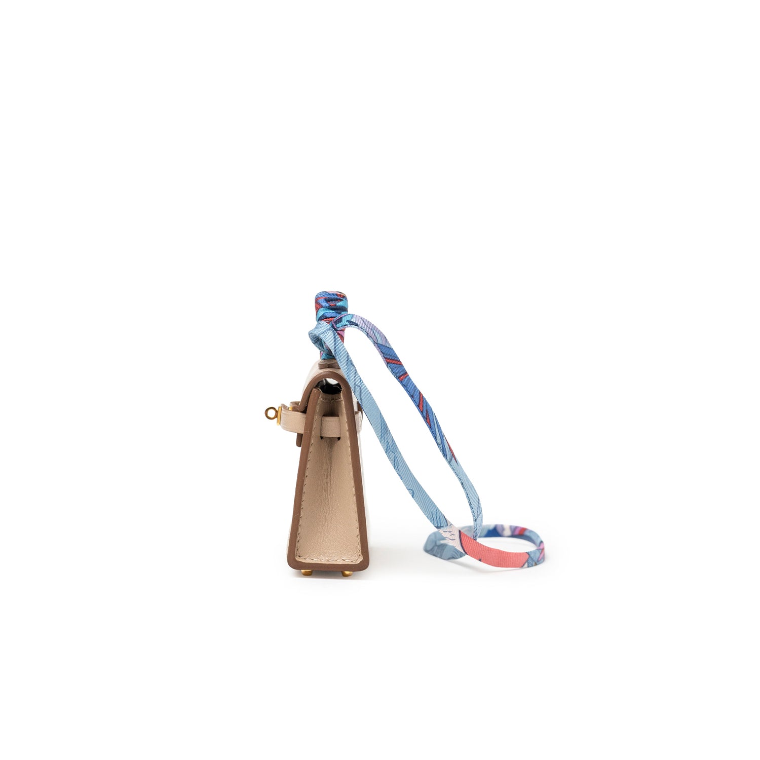 Side view of Hermès Mini Kelly Twilly Bag Charm Argile Tadelakt Gold Hardware with patterned handle