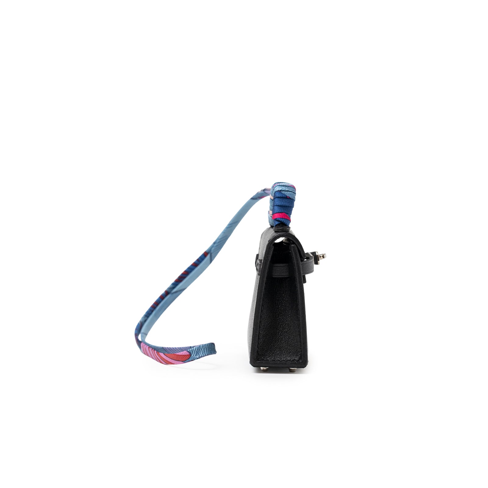 Side view of Hermès Mini Kelly Twilly Bag Charm Black Tadelakt Palladium Hardware with blue strap detail