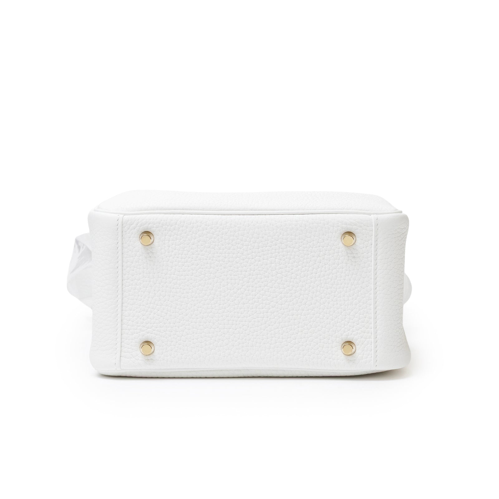 Bottom view of Hermès Mini Lindy II New White Clemence Gold Hardware showing base and protective feet details
