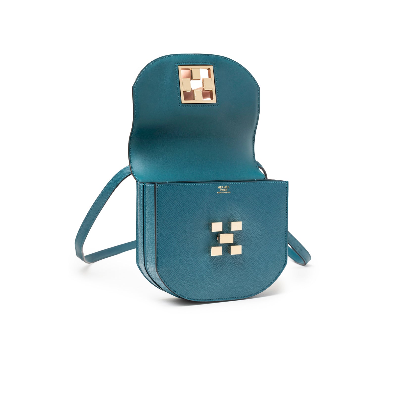 Open front view of Hermès Mosaique Au 24-17 Blue Epsom Permabrass Hardware displaying interior and clasp details