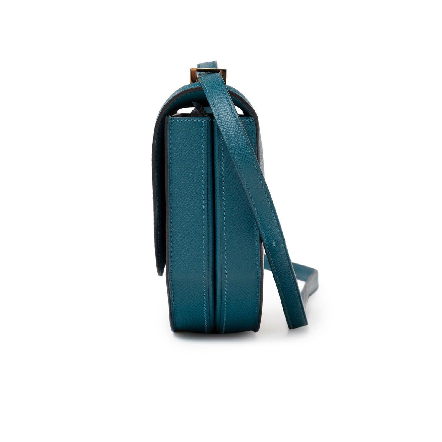 Side profile of Hermès Mosaique Au 24-17 Blue Epsom Permabrass Hardware with textured leather and strap detail