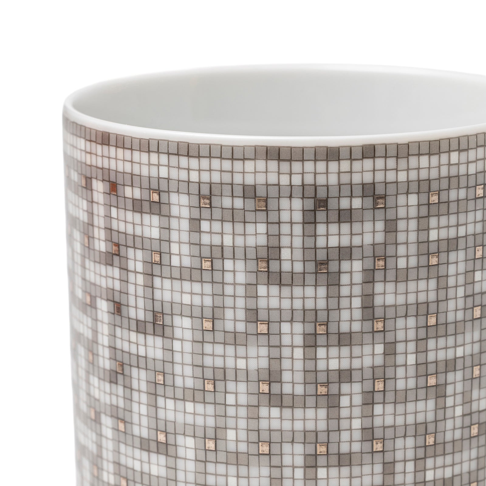 Close-up angled view of Hermès Mosaique au 24 Platinum Mug displaying mosaic pattern with platinum accents on white porcelain