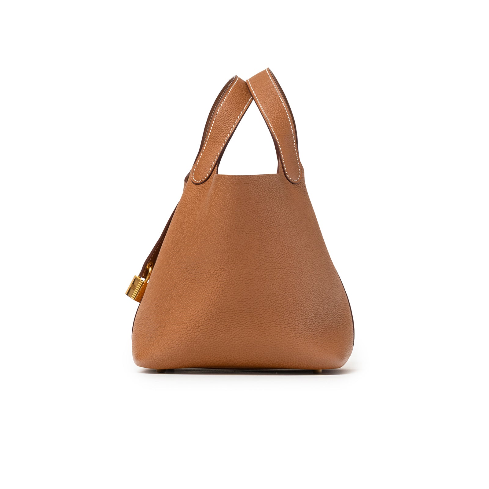 Side view of Hermès Picotin 18 Gold Clemence Gold Hardware D bag in tan leather with gold lock detail