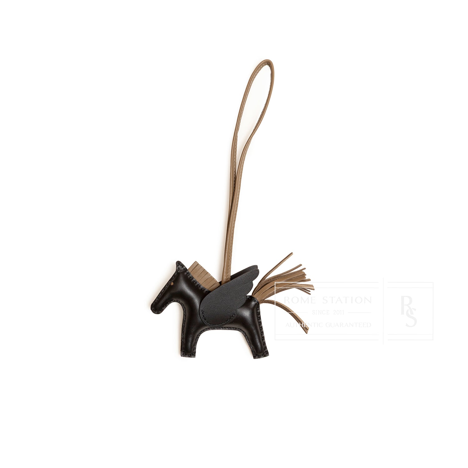 Front view of Hermès Rodeo Pegase Bag Charm PM Black Etoupe Milo Lambskin with stitched details and leather strap