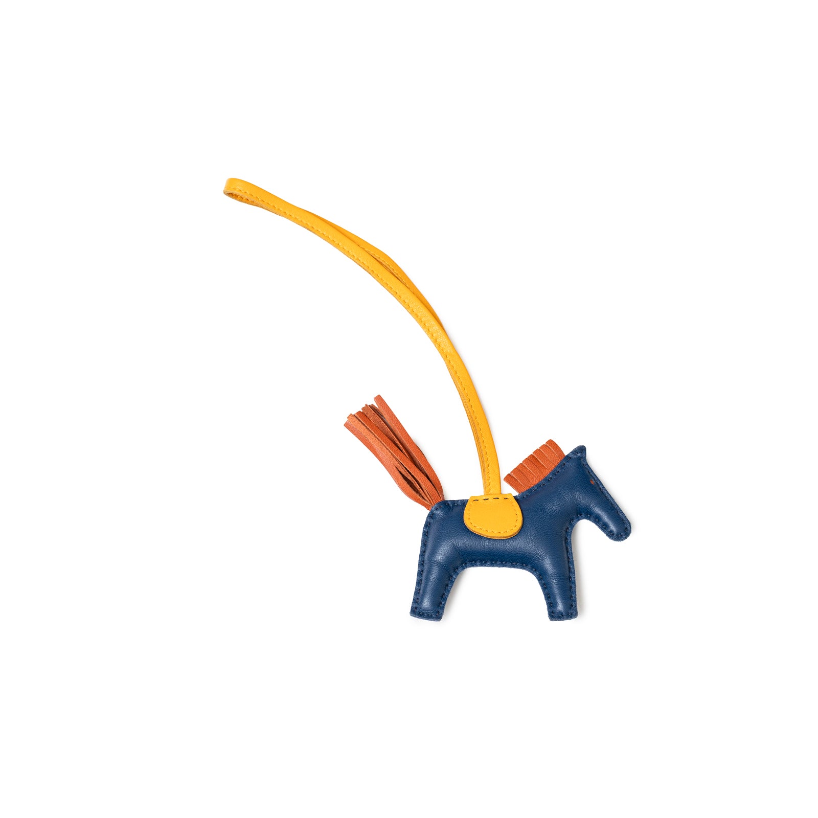 Close-up of Hermès Rodeo PM Blue de Malte/Cornaline/Jaune D'or leather horse charm with yellow strap and orange tail