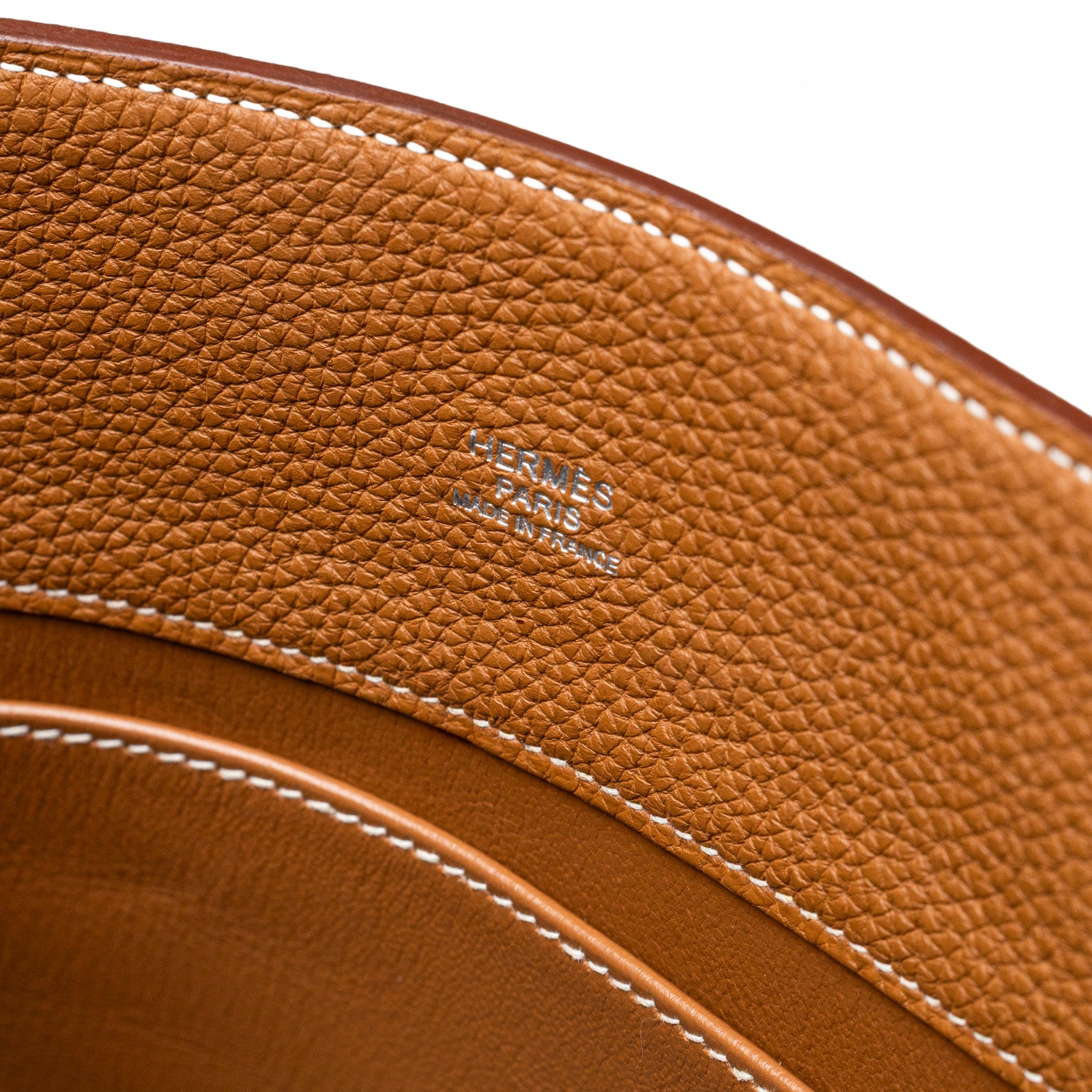 Close-up of Hermès So Kelly 26 Gold Togo Gold Palladium Hardware showing embossed brand stamp and stitching detail