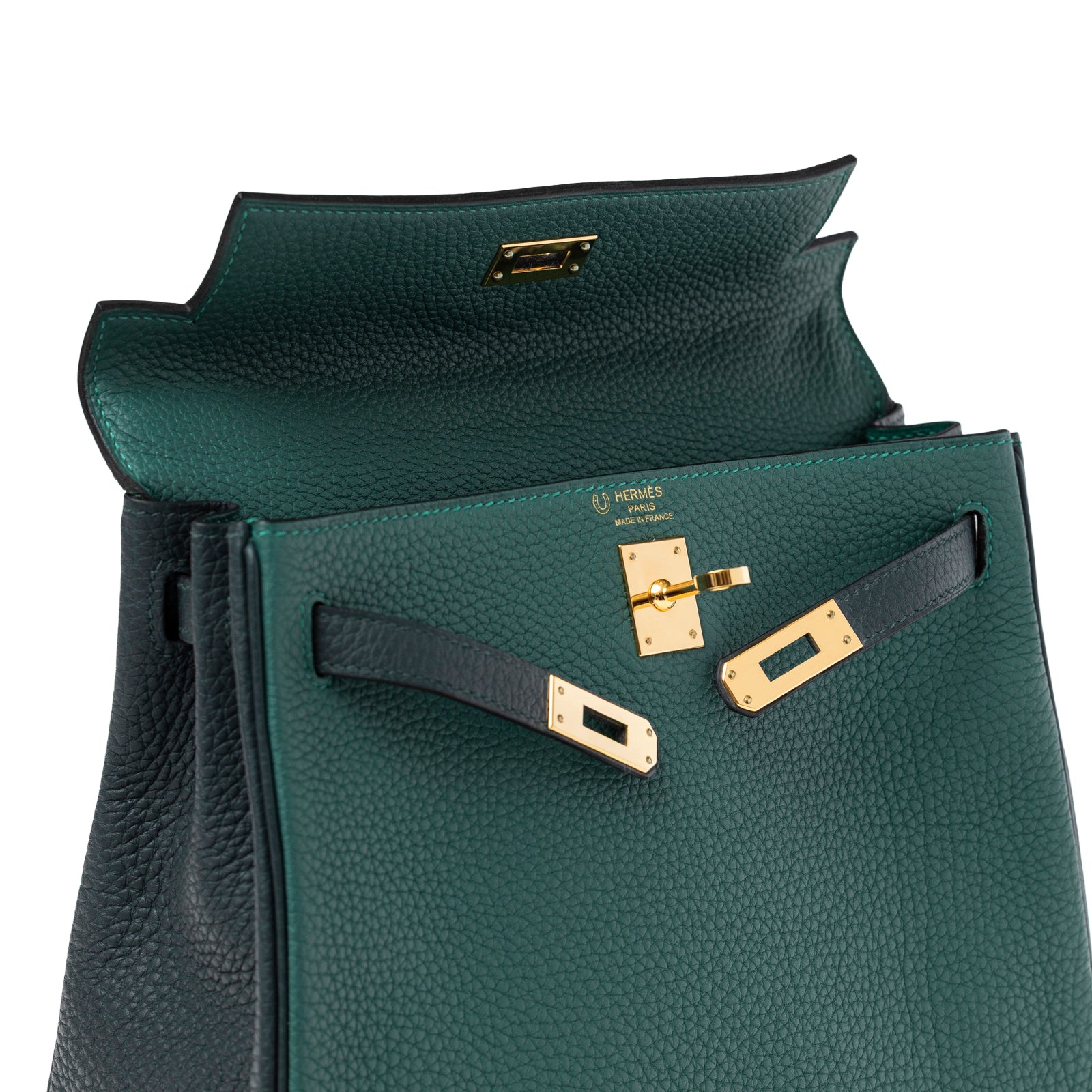 Close-up angled view of Hermès Special Order HSS Horseshoe Kelly 25 Malachite Vert Togo Gold Hardware showing interior flap and clasp details