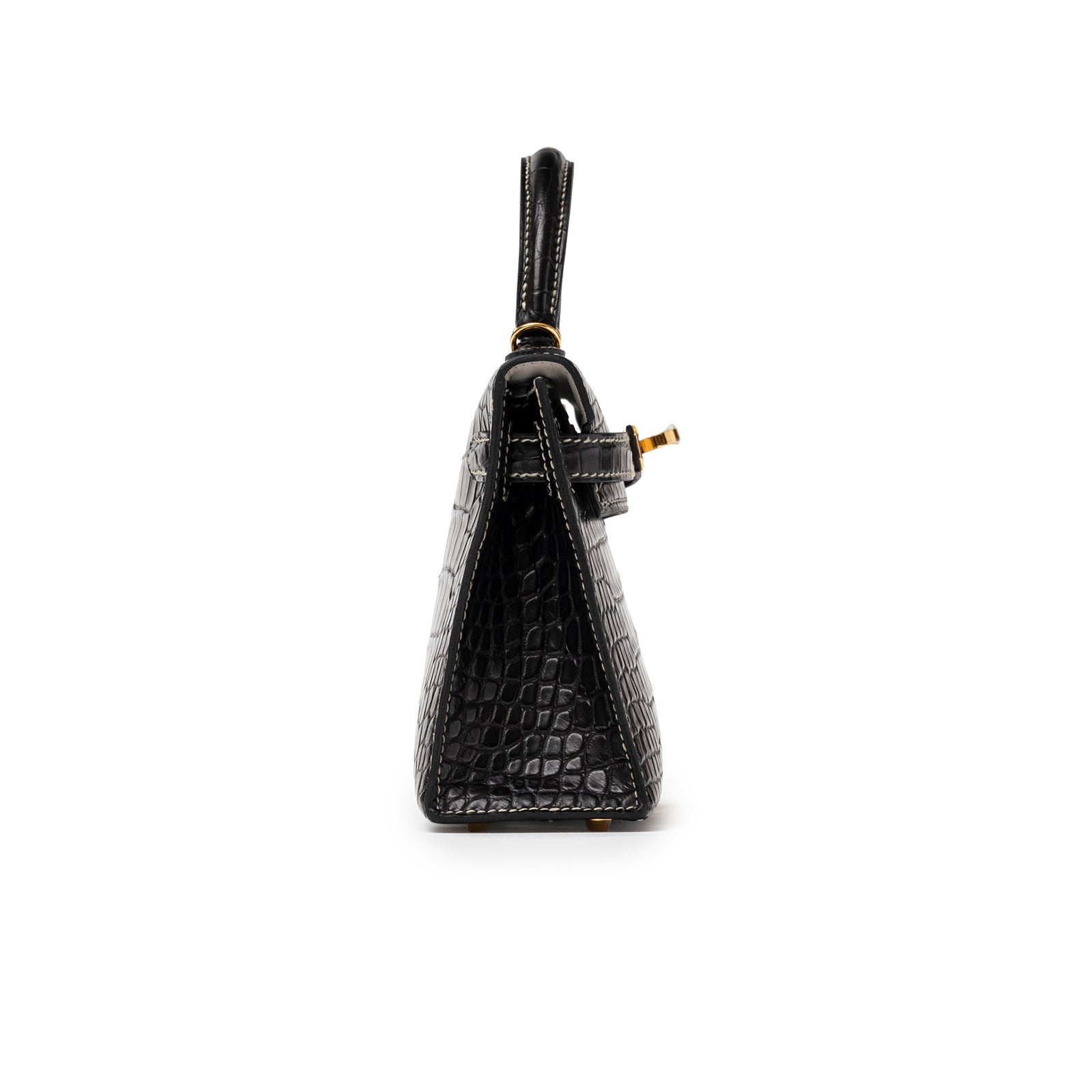 Side view of Hermès Special Order HSS Horseshoe Mini Kelly II Black Gris Matte Alligator Gold Hardware showing textured leather and gold clasp