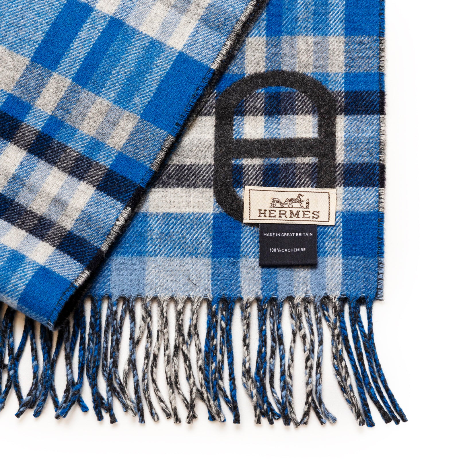 Hermès Tartan Maillons Muffler Cashmere Scarf Anthracite Blue in a soft, blue and gray plaid with fringe detailing and label visible