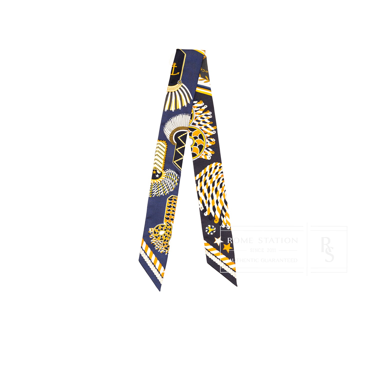Front view of Hermès Twilly Epaulettes De Gala Marine Gold Blanc with navy, gold, and white intricate patterns