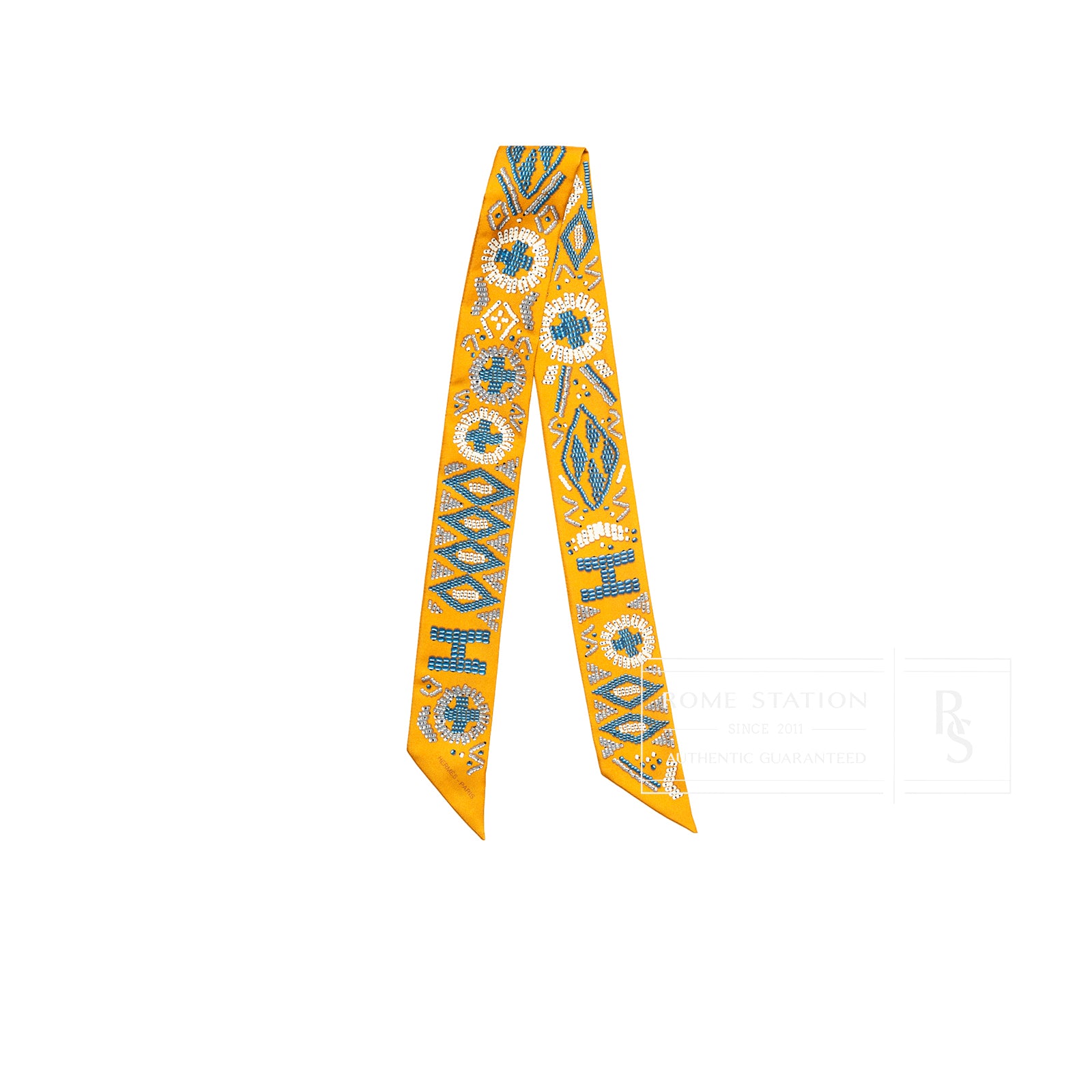 Front view of Hermès Twilly Kelly en Perles Jaune Blanc Blue showing geometric beadwork on bright yellow silk