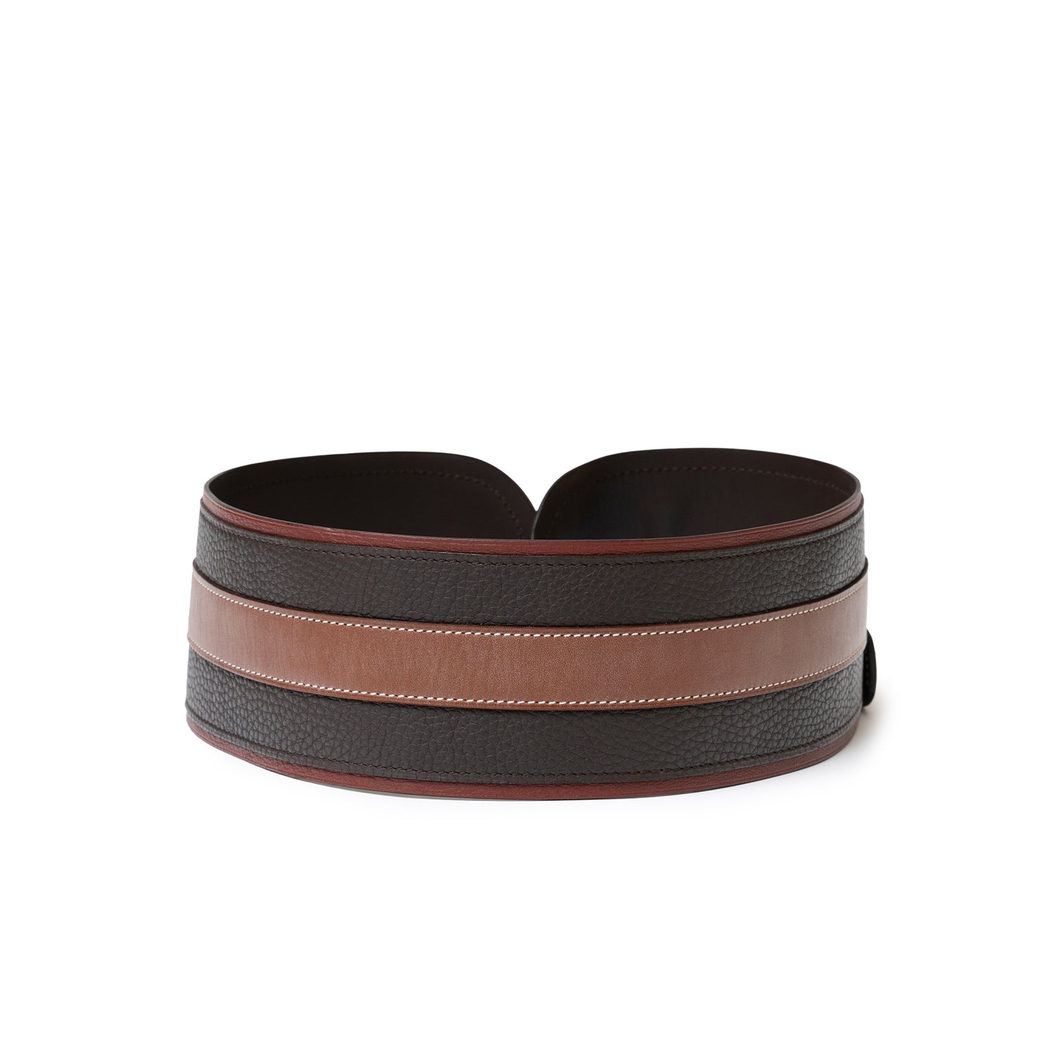 Angled close-up of Hermès Vintage Waist Belt Brown/Rouge/Natural showing textured leather and contrasting stitching detail