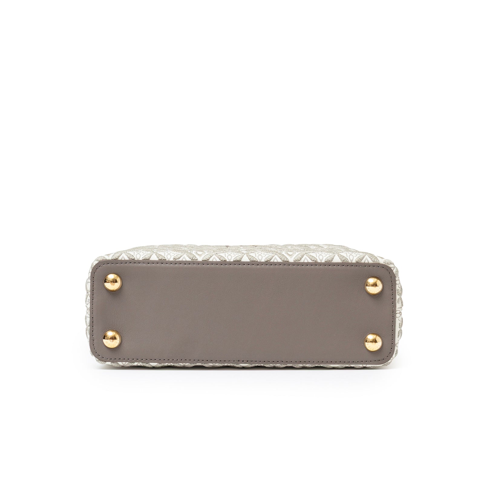 Bottom view of Louis Vuitton Since 1854 Embroidered Capucines BB Ecru/Taupe Calf Gold Hardware showing gold feet and taupe leather base