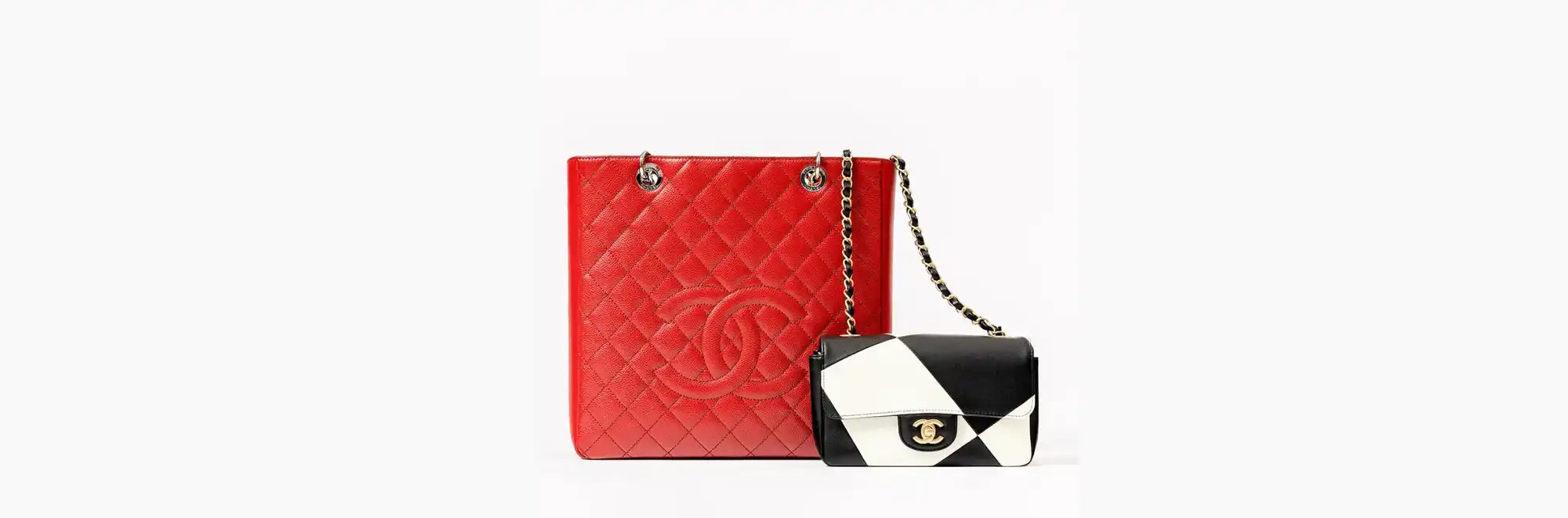 Red and black-and-white Chanel handbags.