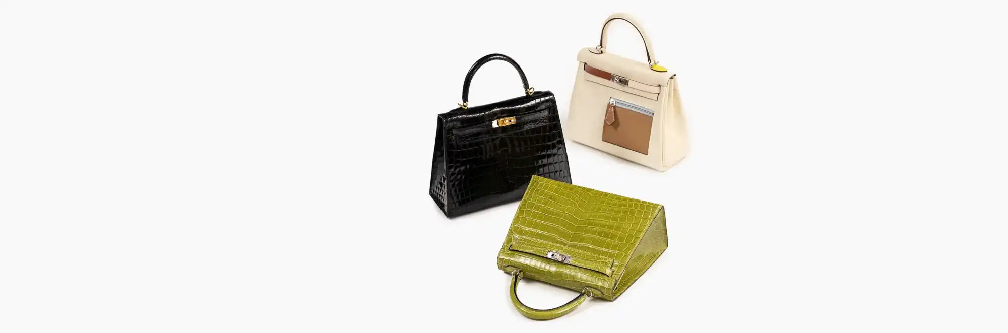 Three structured handbags.