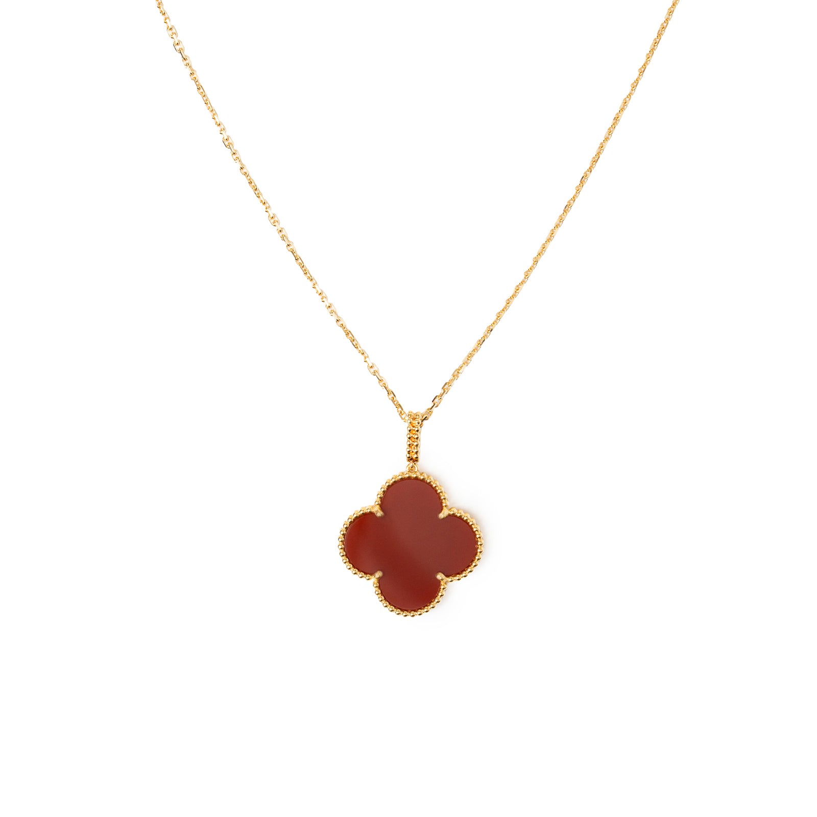 Close-up front view of Van Cleef & Arpels Magic Alhambra 1 Motif Long Necklace 18K Yellow Gold Carnelian pendant