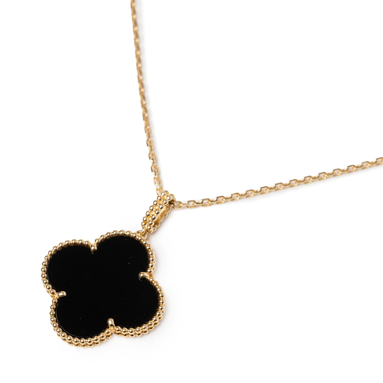 Close-up of Van Cleef & Arpels Magic Alhambra 1 Motif Long Necklace Onyx 18K Yellow Gold pendant detail