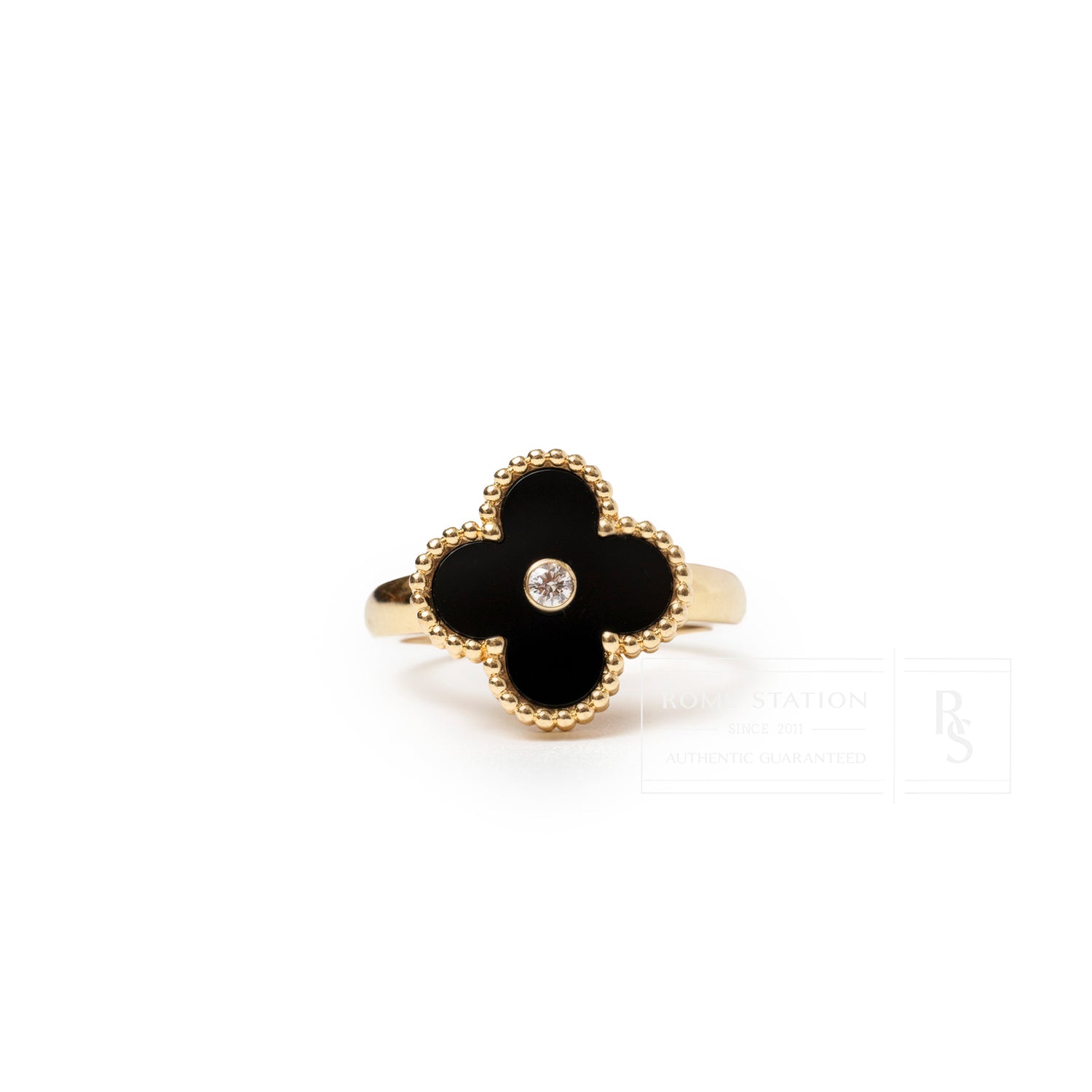 Front view of Van Cleef & Arpels Vintage Alhambra Onyx Diamond Ring featuring a black onyx clover with central diamond