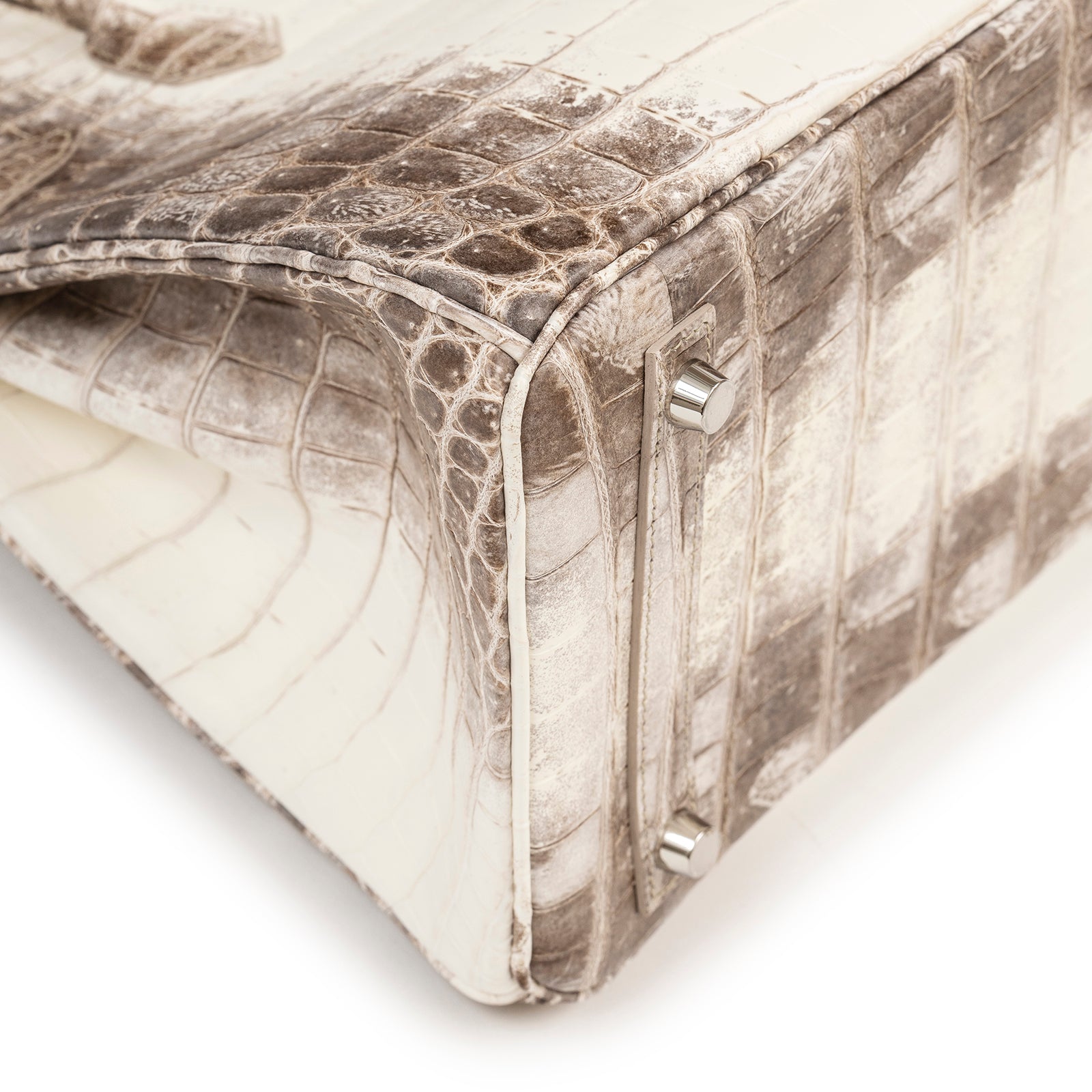 Close-up of corner and palladium feet on Hermès Himalaya Birkin 30 Matte Niloticus Crocodile Palladium Hardware