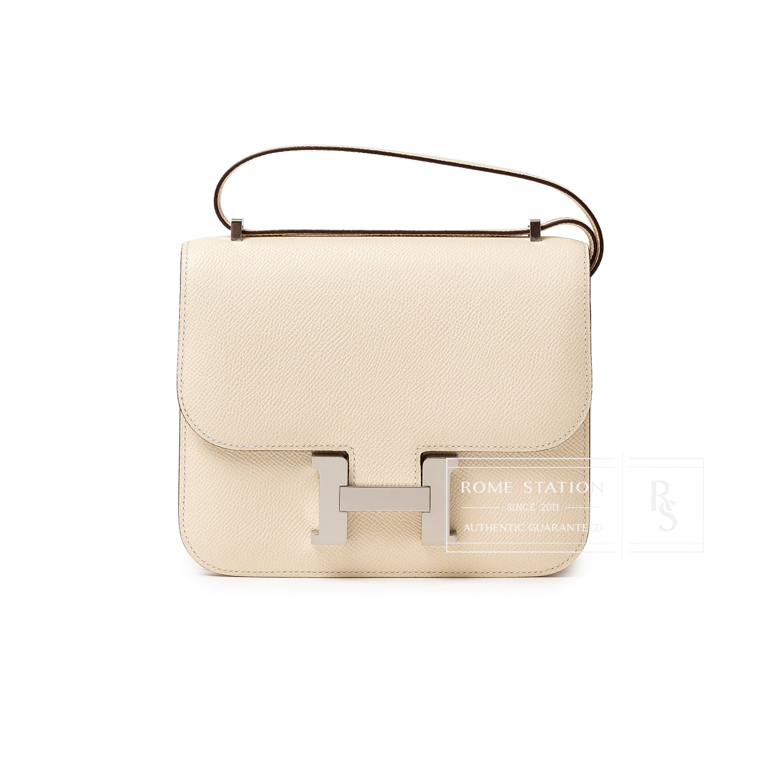 Front view of Hermès Mini Constance 18 Nata Epsom Palladium Hardware with smooth cream leather and silver clasp detail