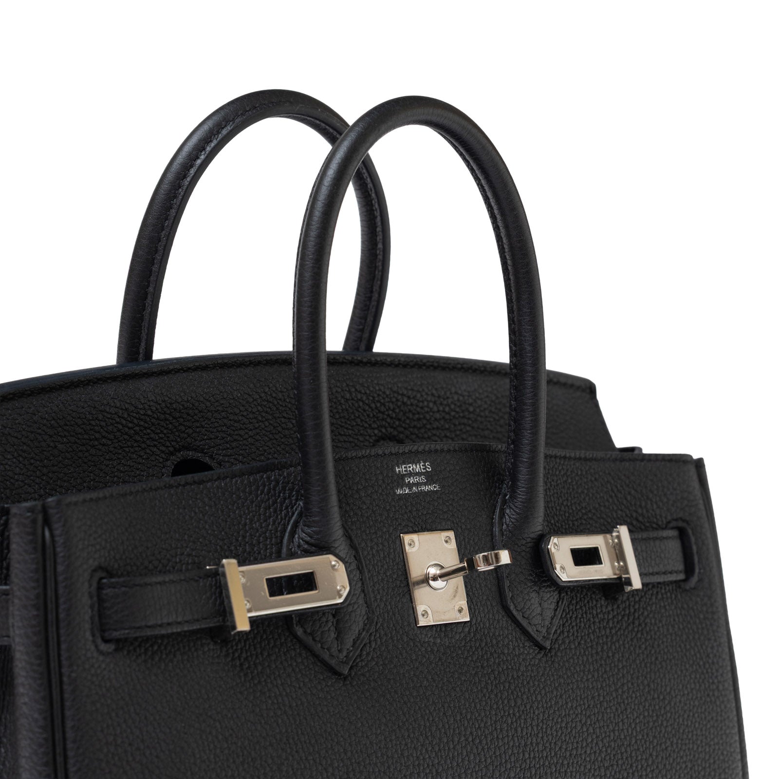 Close-up front view of Hermès Birkin 25 Black Togo Palladium Hardware showing handles and front detail